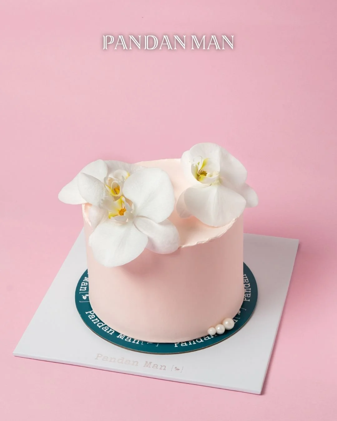 Flowers fade, but dessert gets eaten &mdash; so why not have both this Mother's Day? 🌼🤔

Our Mother of Pearls Orchid Pandan Cake brings together elegance and indulgence in one beautiful creation. Topped with a real orchid blossom and layered with v