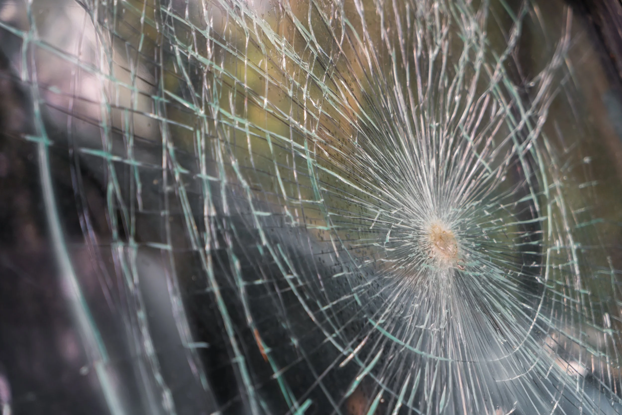 glass-broken-cracks-splinters-front-car-filtered-image.jpg