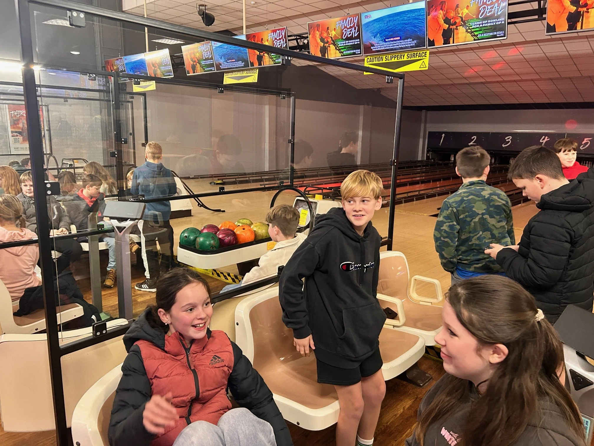 Announcement poster for Rendesham Youth Club sign-up and meet the team session happening at Rendesham Community Centre on Monday, October 27th from 1 to 3 PM, with a background featuring a partially visible logo and flag.