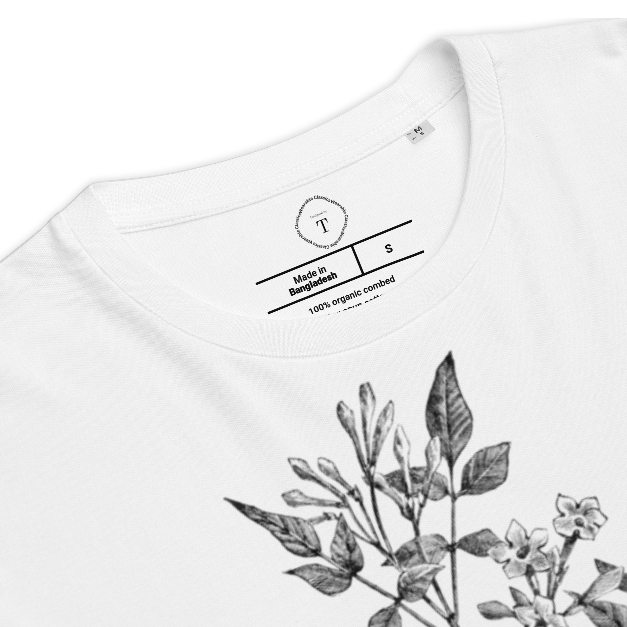 White Unisex Cotton T-Shirt folded close up with black and white image of jasmine flower in the centre