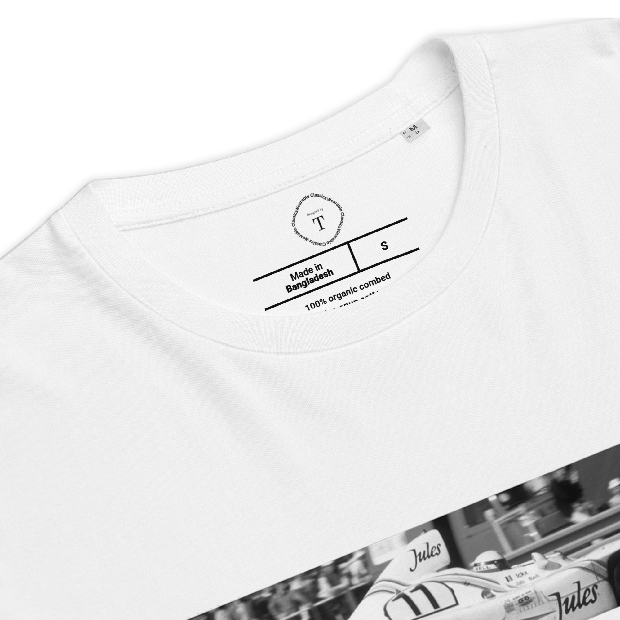 Black Unisex Cotton T-Shirt folded close up with banner image of Porsche 1981 at Le Mans in the centre with text of coordinates and date of race