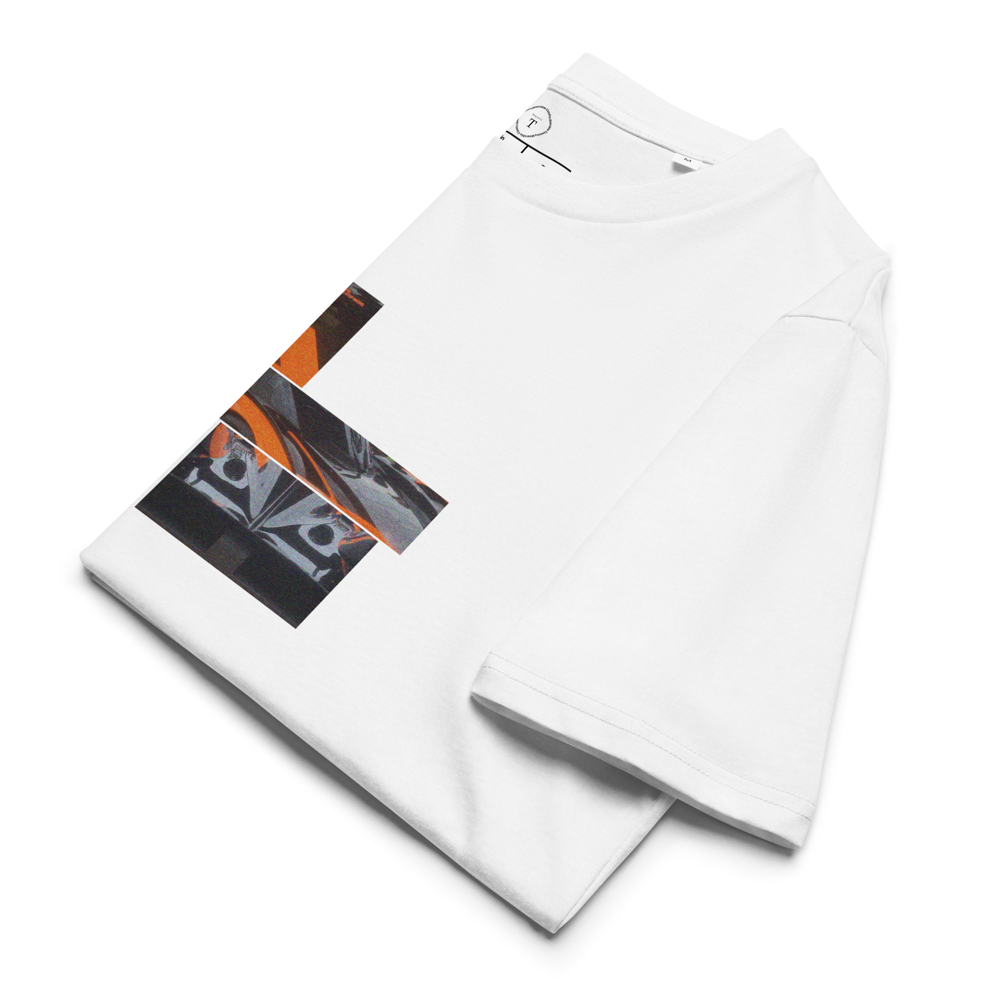 White Unisex Cotton T-Shirt folded close up with sqaure box design with photographs of McLaren Racing from multiple angles at Le Mans