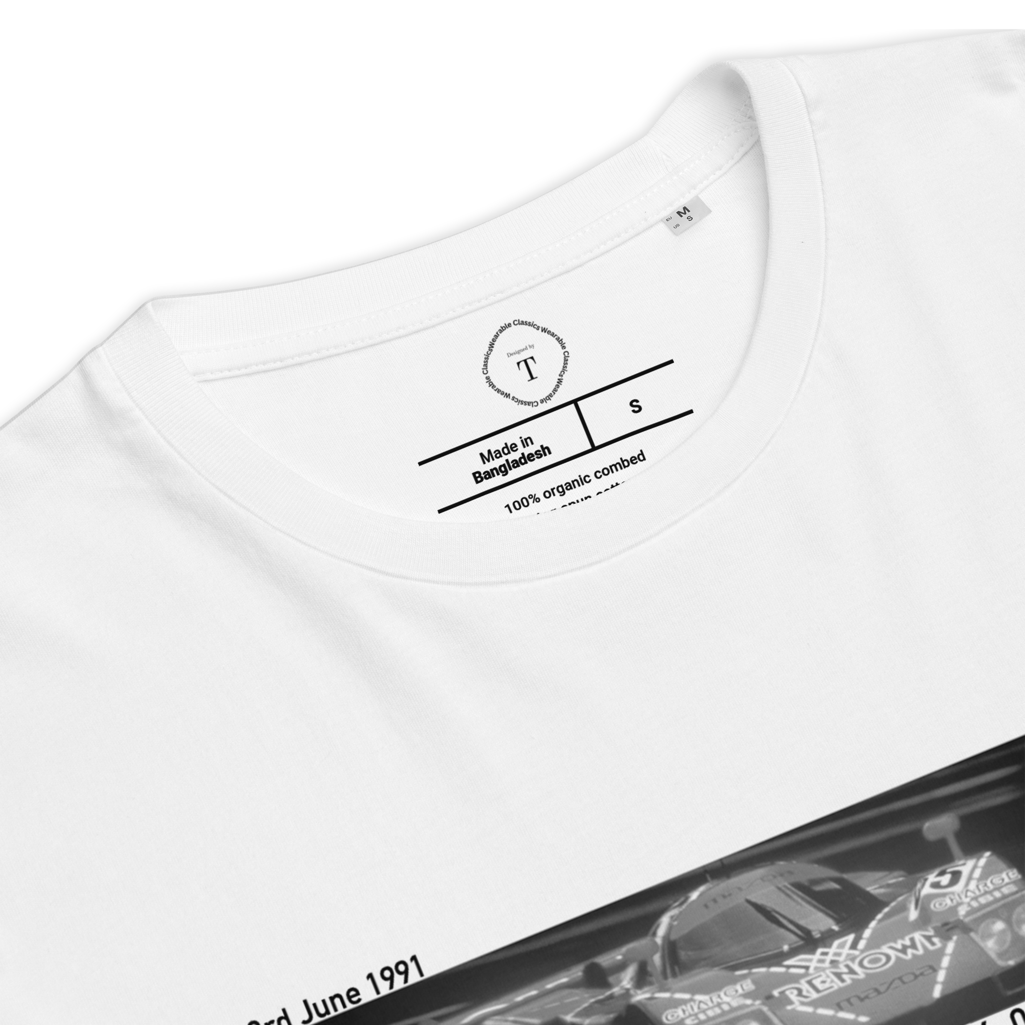 White Unisex Cotton T-Shirt folded close up with banner image of Mazda 787B 1991 at Le Mans in the centre with text of coordinates and date of race