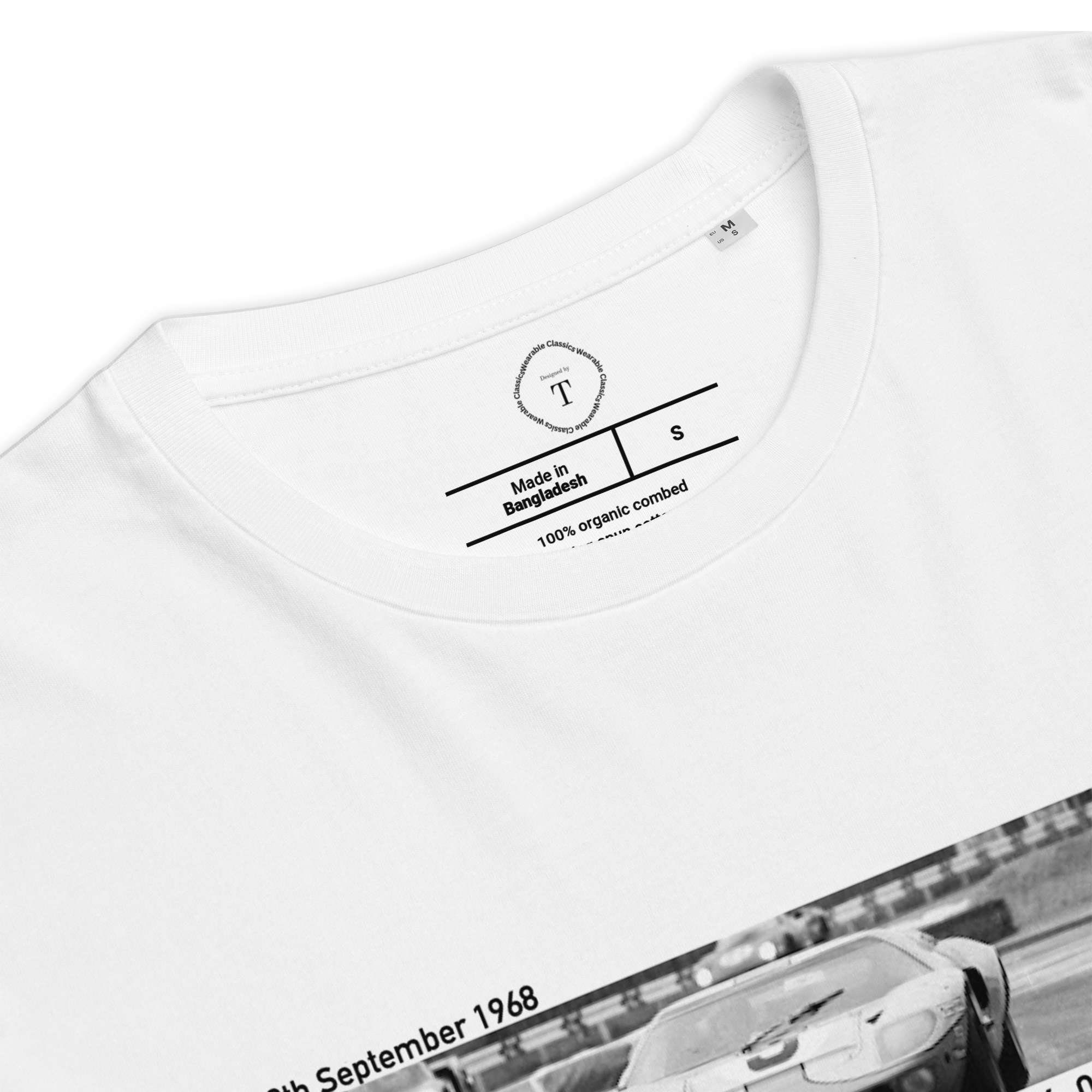 White Unisex Cotton T-Shirt folded close up with banner image of Ford GT40 1968 at Le Mans in the centre with text of coordinates and date of race
