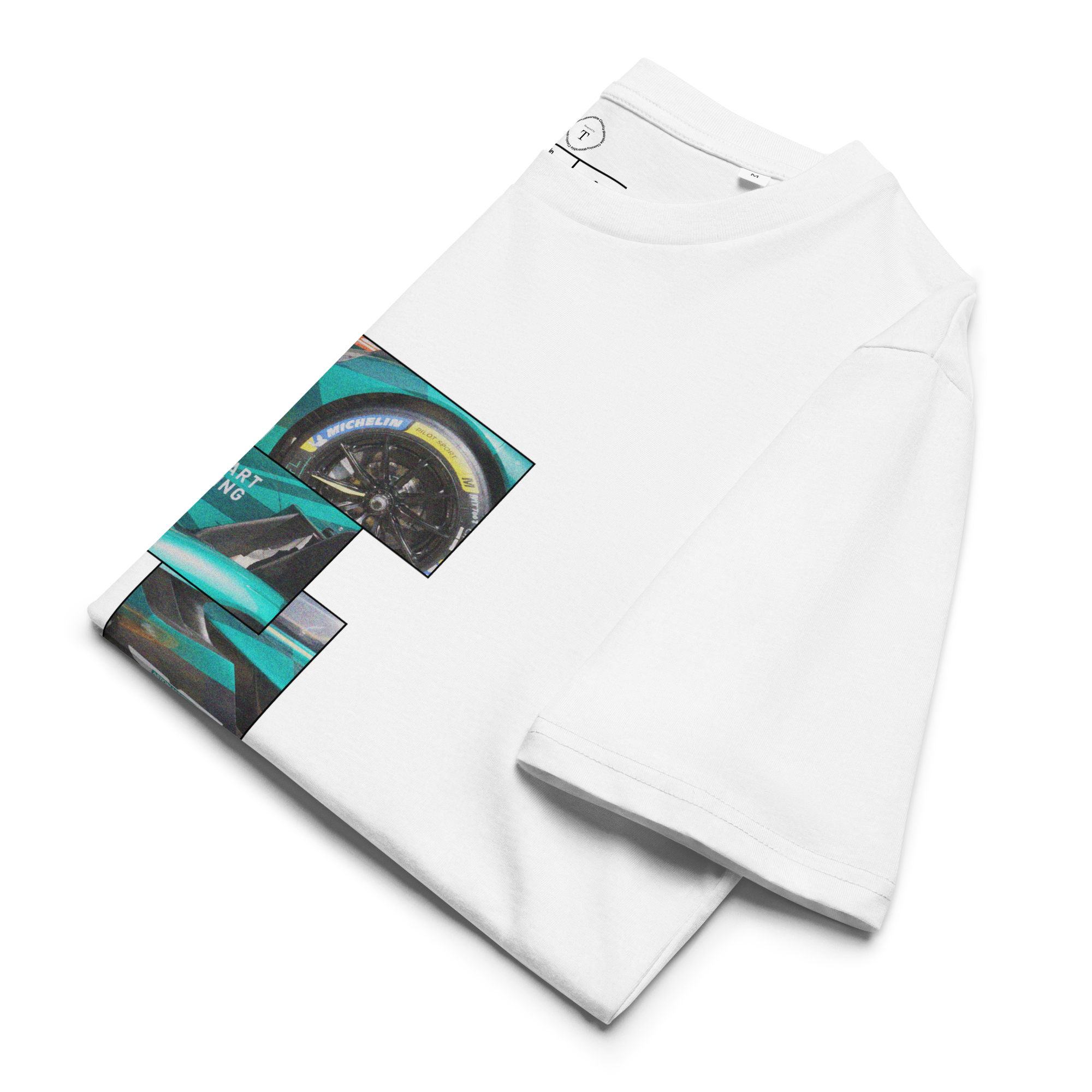 White Unisex Cotton T-Shirt folded close up with sqaure box design with photographs of Aston Martin from multiple angles at Le Mans