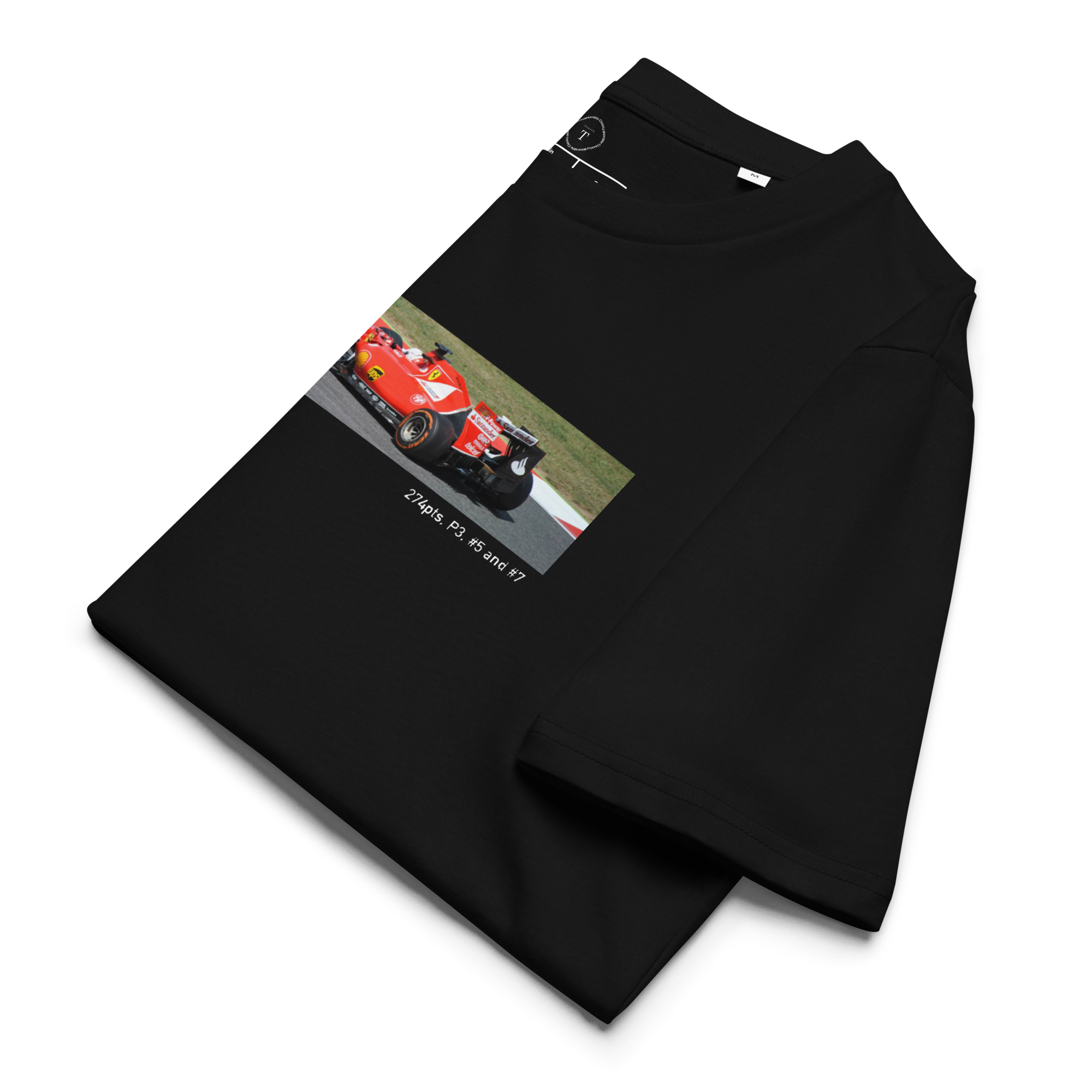 Black Unisex Cotton T-Shirt folded close up with banner image of Ferrari F1 SF15 XJR-9 on track in the centre with text of coordinates and date of race