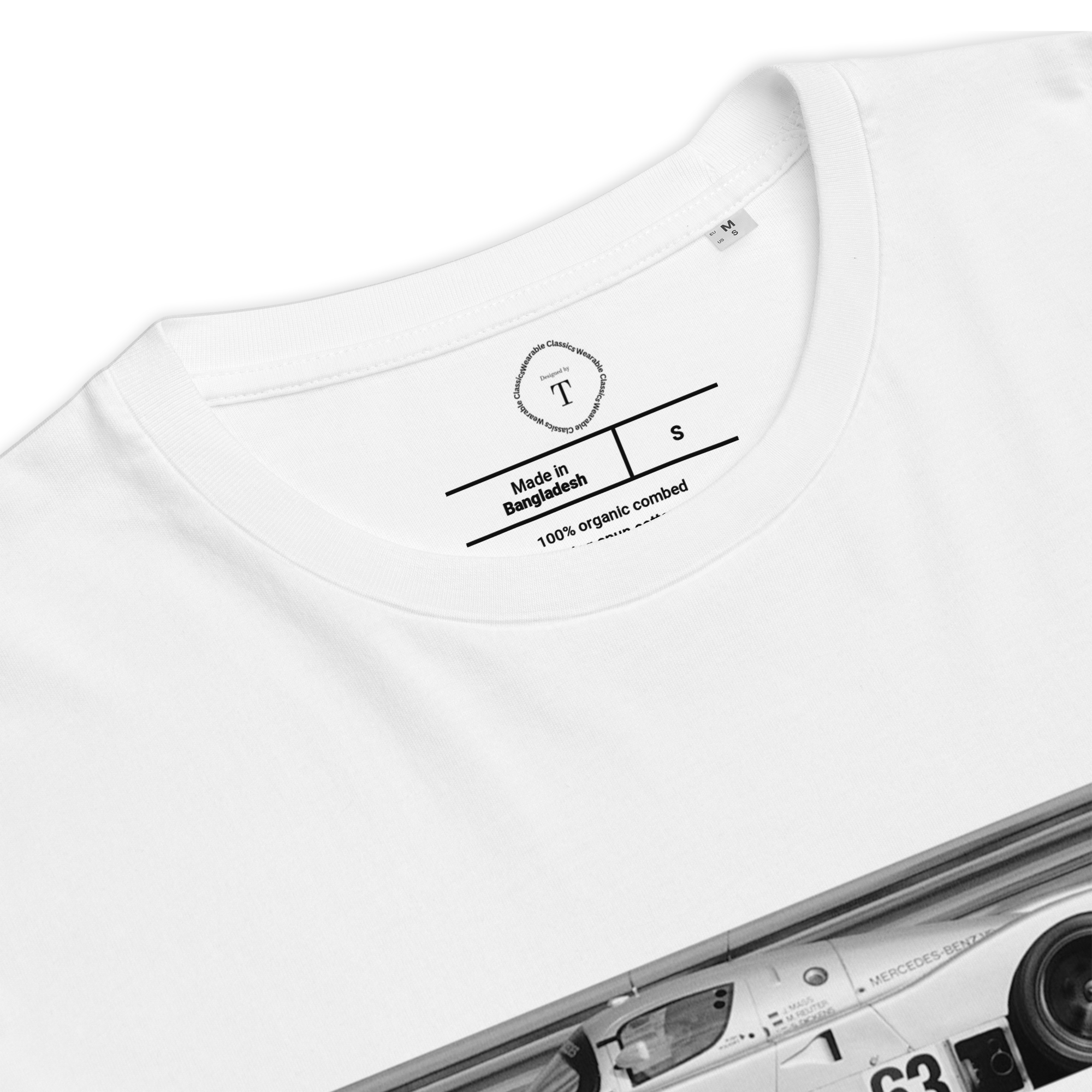 White Unisex Cotton T-Shirt folded close up with banner image of Mercedes C9 1989 at Le Mans in the centre with text of coordinates and date of race