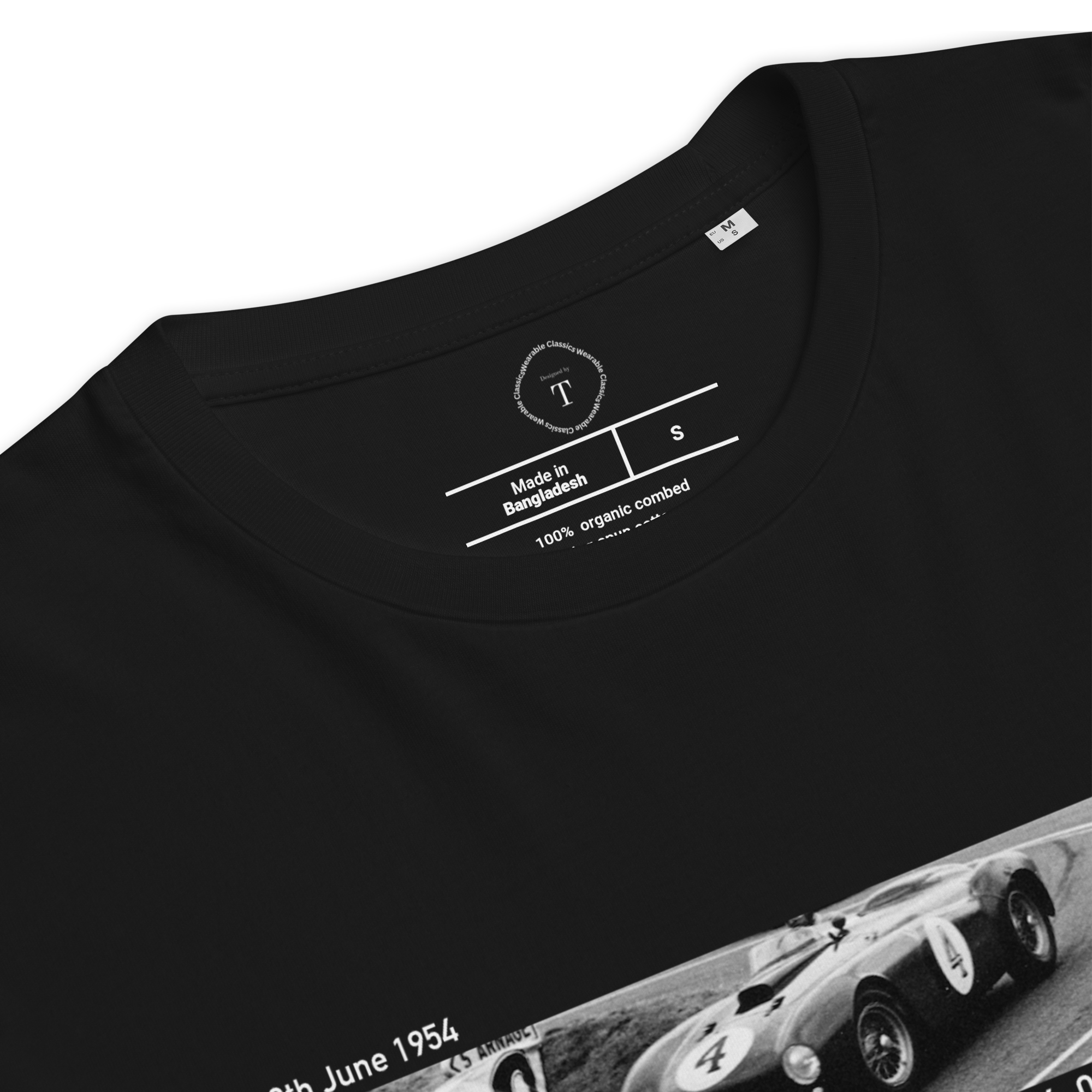 Black Unisex Cotton T-Shirt folded close up with banner image of 1954 Ferrari at Le Mans in the centre with text of coordinates and date of race