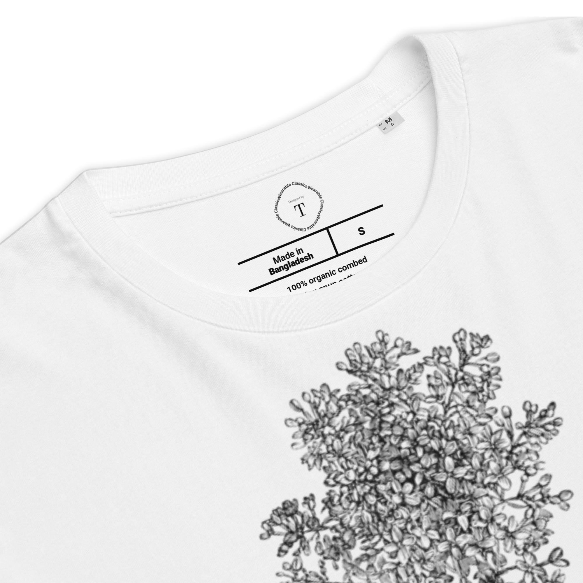 White Unisex Cotton T-Shirt folded close up with black and white image of wildflower in the centre