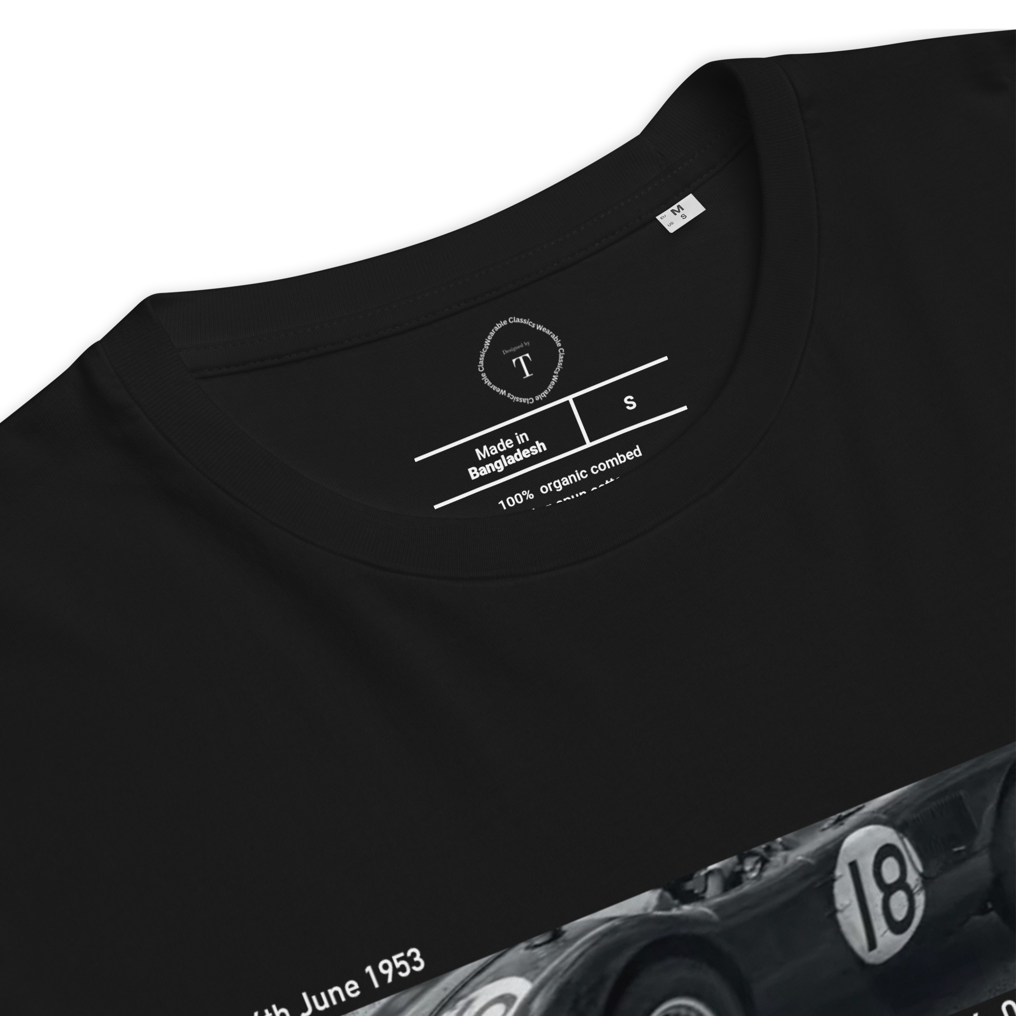 Black Unisex Cotton T-Shirt folded close up with banner image of 1953 Jaguar C Type at Le Mans in the centre with text of coordinates and date of race