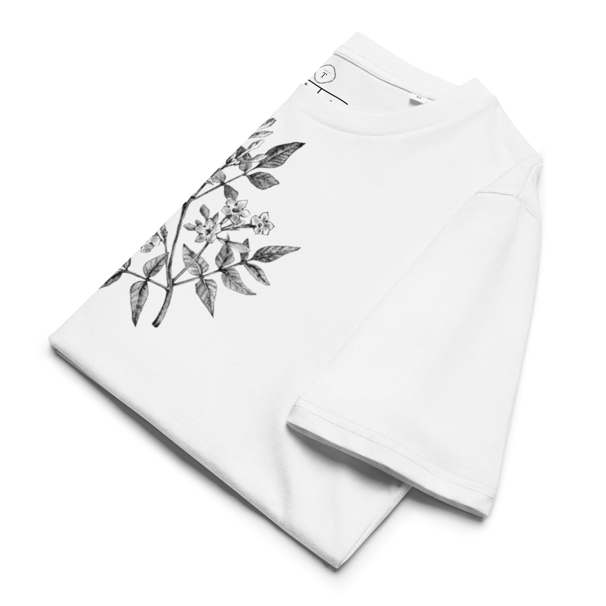 White Unisex Cotton T-Shirt folded close up with black and white image of jasmine flower in the centre
