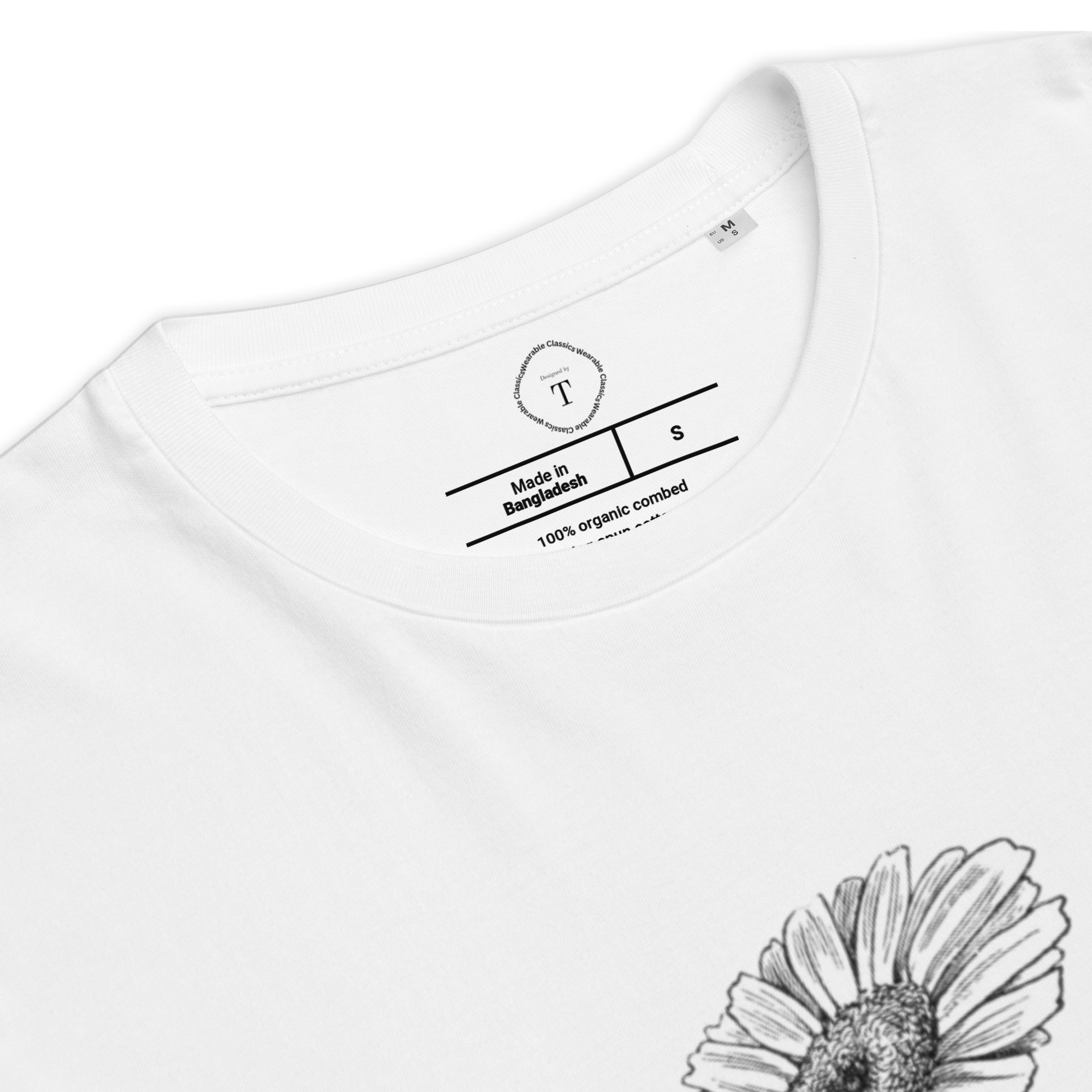 White Unisex Cotton T-Shirt folded close up with black and white image of daisy flower in the centre