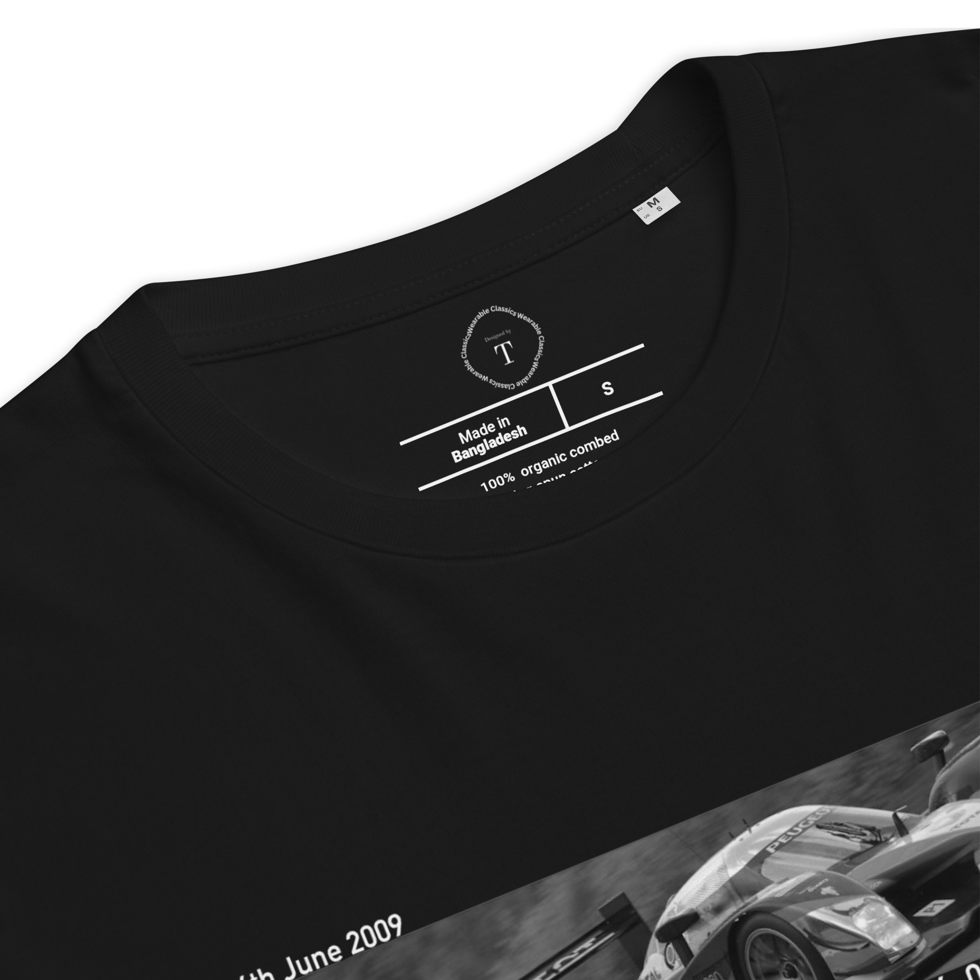 Black Unisex Cotton T-Shirt folded close up with banner image of Peugeot 2009 at Le Mans in the centre with text of coordinates and date of race