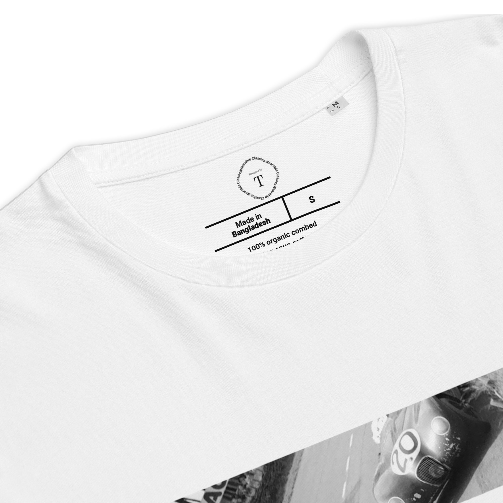 White Unisex Cotton T-Shirt folded close up with banner image of 1951 Victor Jaguar C Type at Le Mans in the centre with text of coordinates and date of race