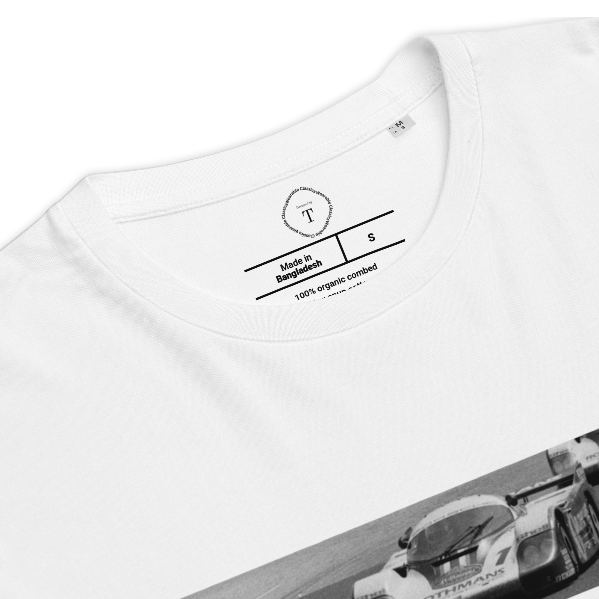 White Unisex Cotton T-Shirt folded close up with banner image of Porsche 1982 at Le Mans in the centre with text of coordinates and date of race