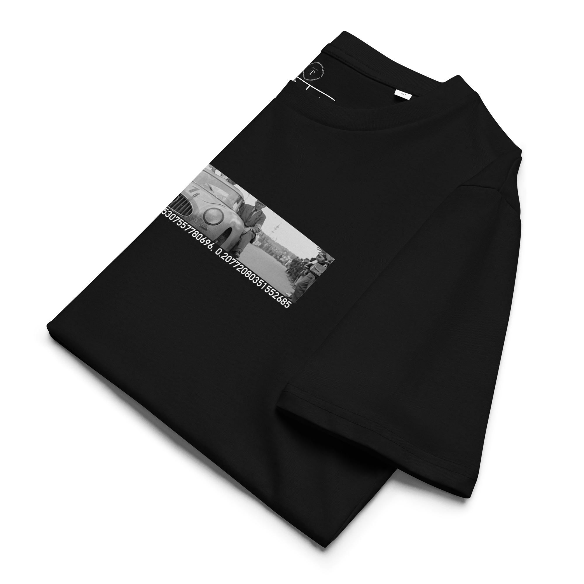 Black Unisex Cotton T-Shirt folded close up with banner image of 1952 Mercedes 300SL Gullwing at Le Mans in the centre with text of coordinates and date of race