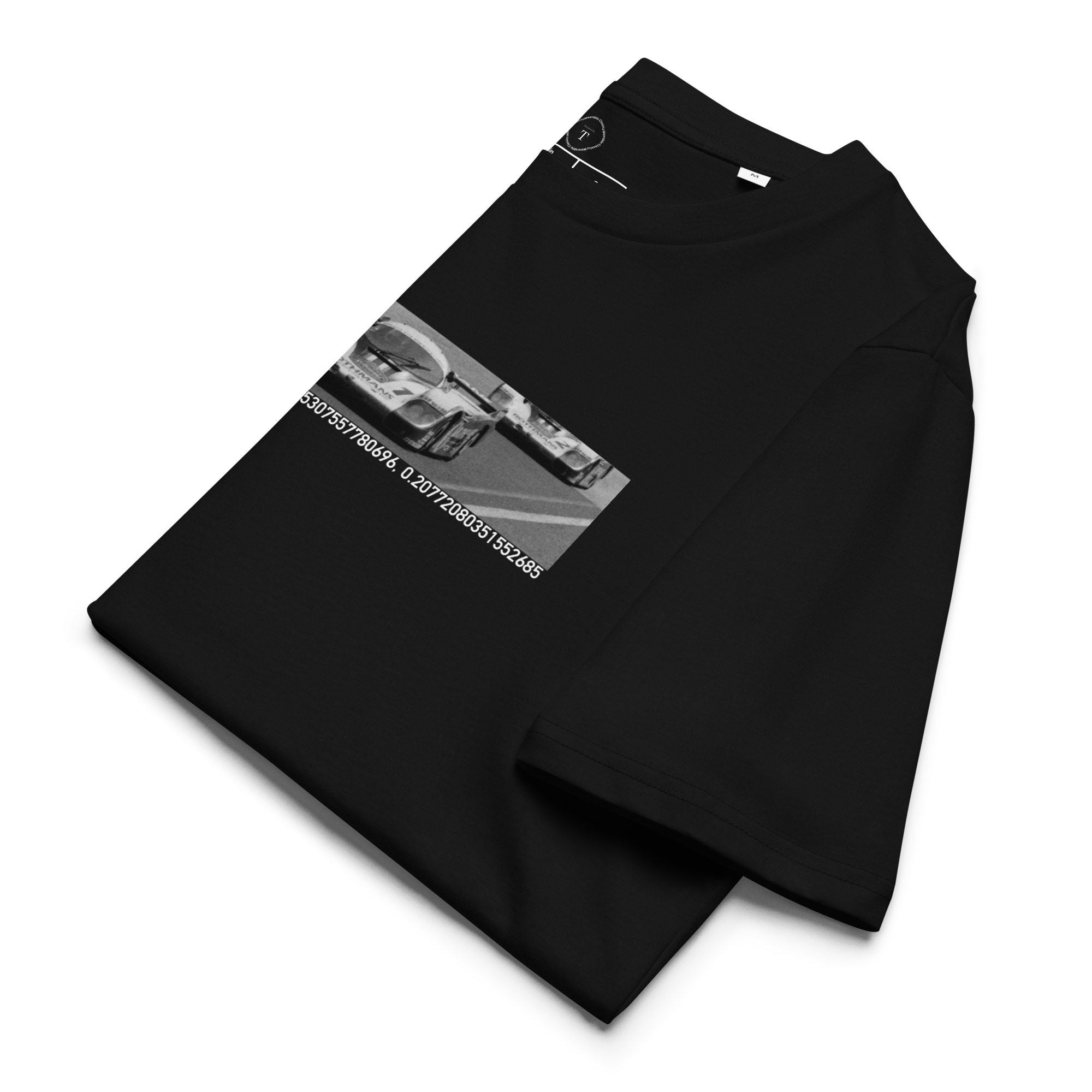 Black Unisex Cotton T-Shirt folded close up with banner image of Porsche 1982 at Le Mans in the centre with text of coordinates and date of race