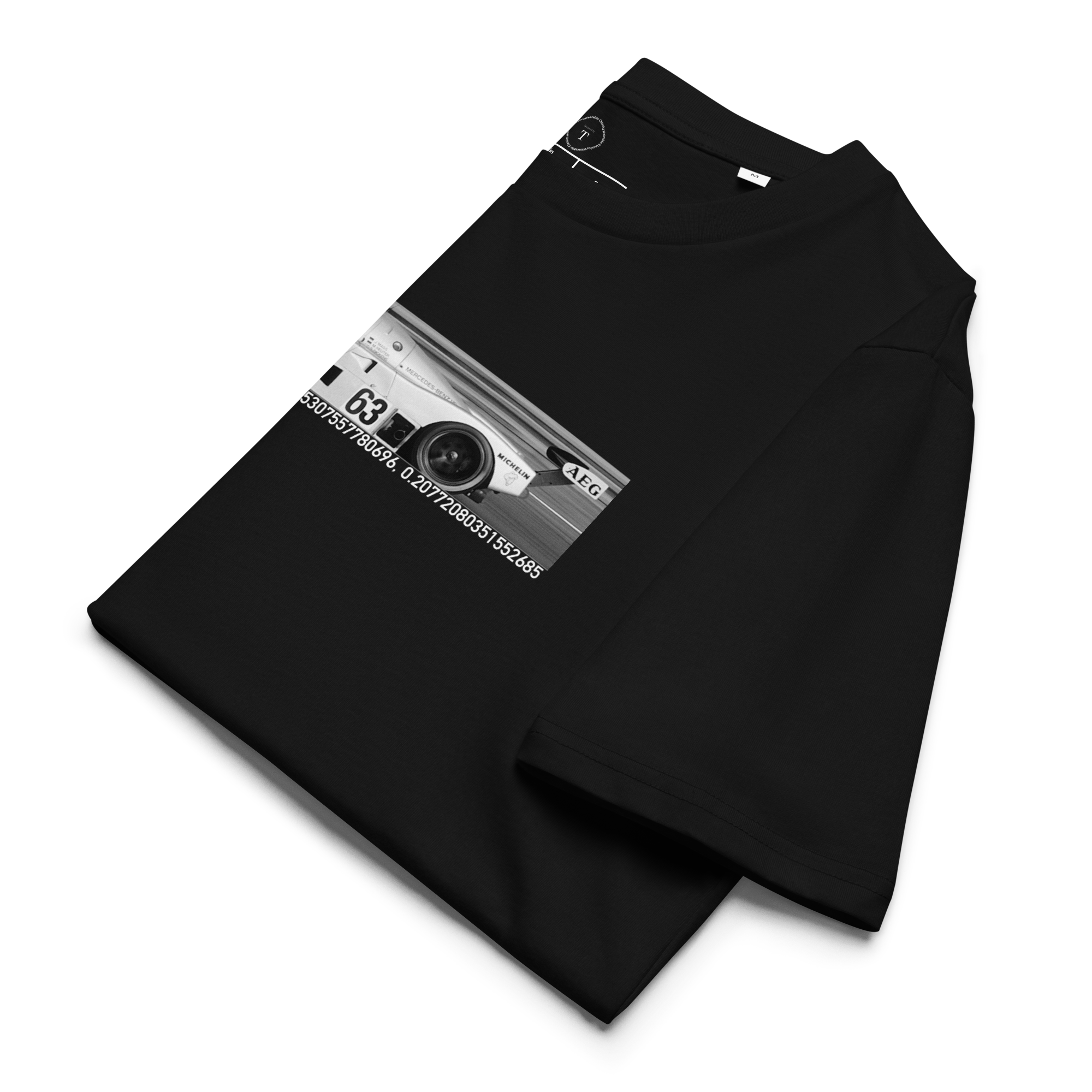 Black Unisex Cotton T-Shirt folded close up with banner image of Mercedes C9 1989 at Le Mans in the centre with text of coordinates and date of race