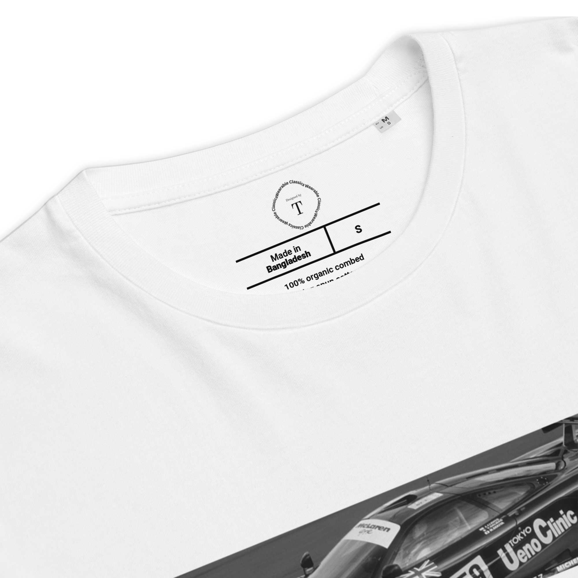White Unisex Cotton T-Shirt folded close up with banner image of McLaren 1995 at Le Mans in the centre with text of coordinates and date of race