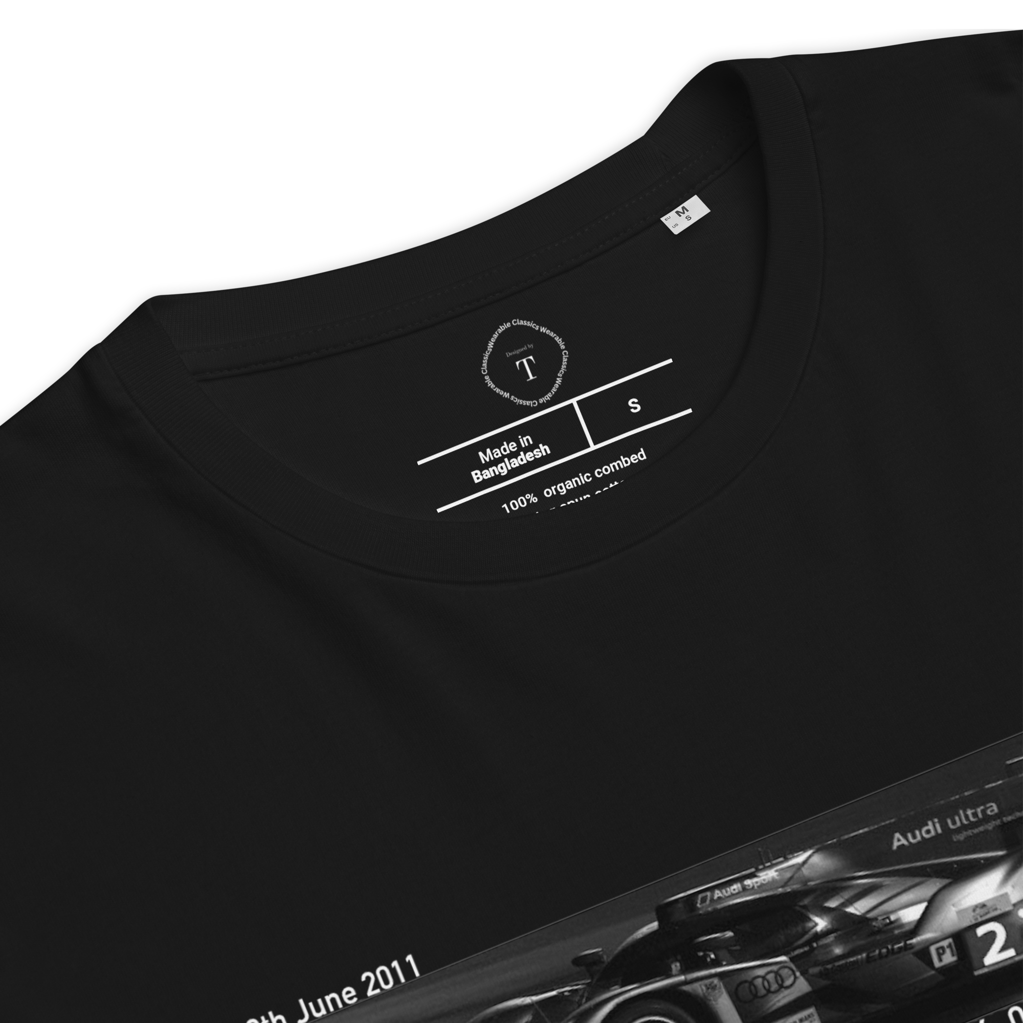 Black Unisex Cotton T-Shirt folded close up with banner image of Audi 2011 at Le Mans in the centre with text of coordinates and date of race
