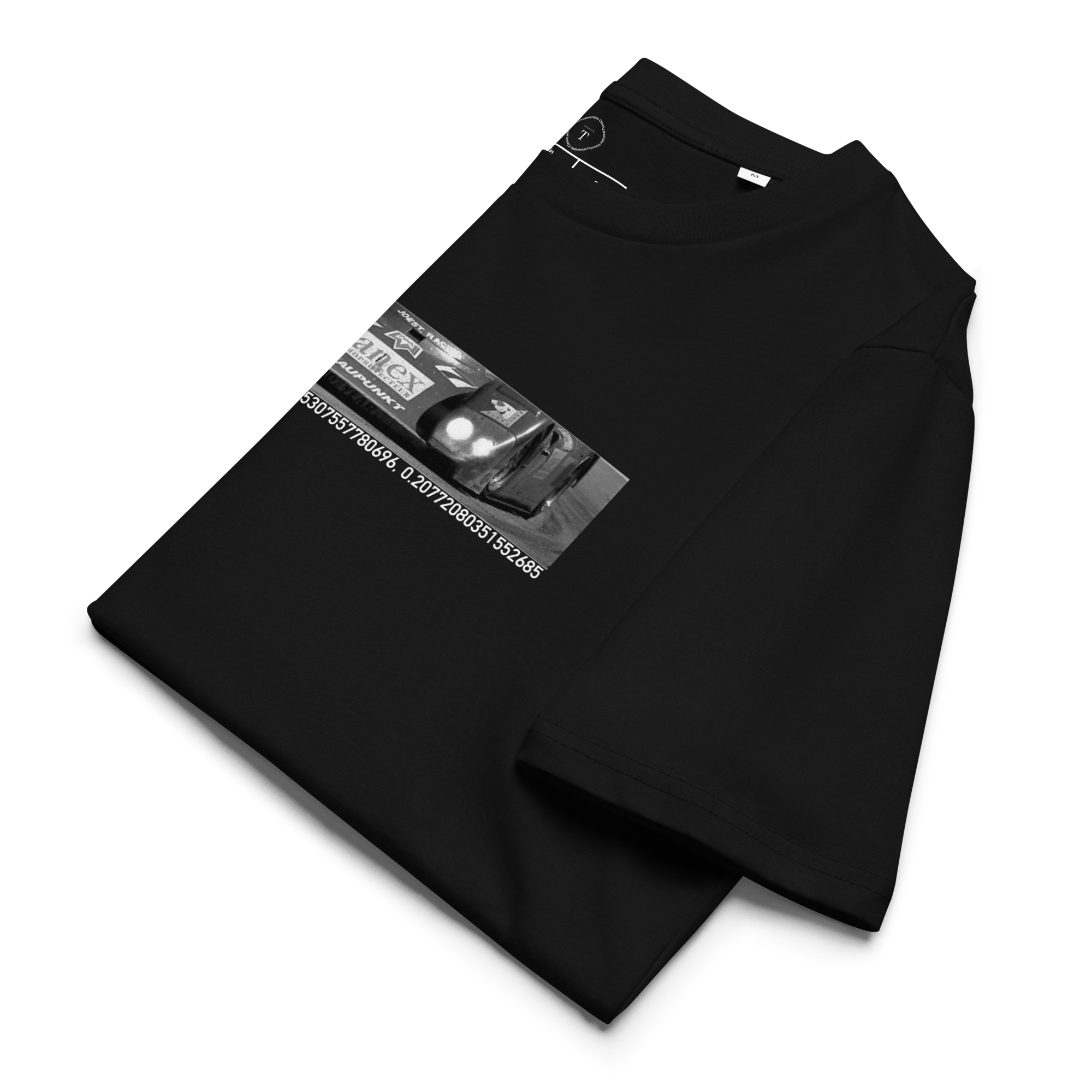 Black Unisex Cotton T-Shirt folded close up with banner image of Porsche 1996 at Le Mans in the centre with text of coordinates and date of race