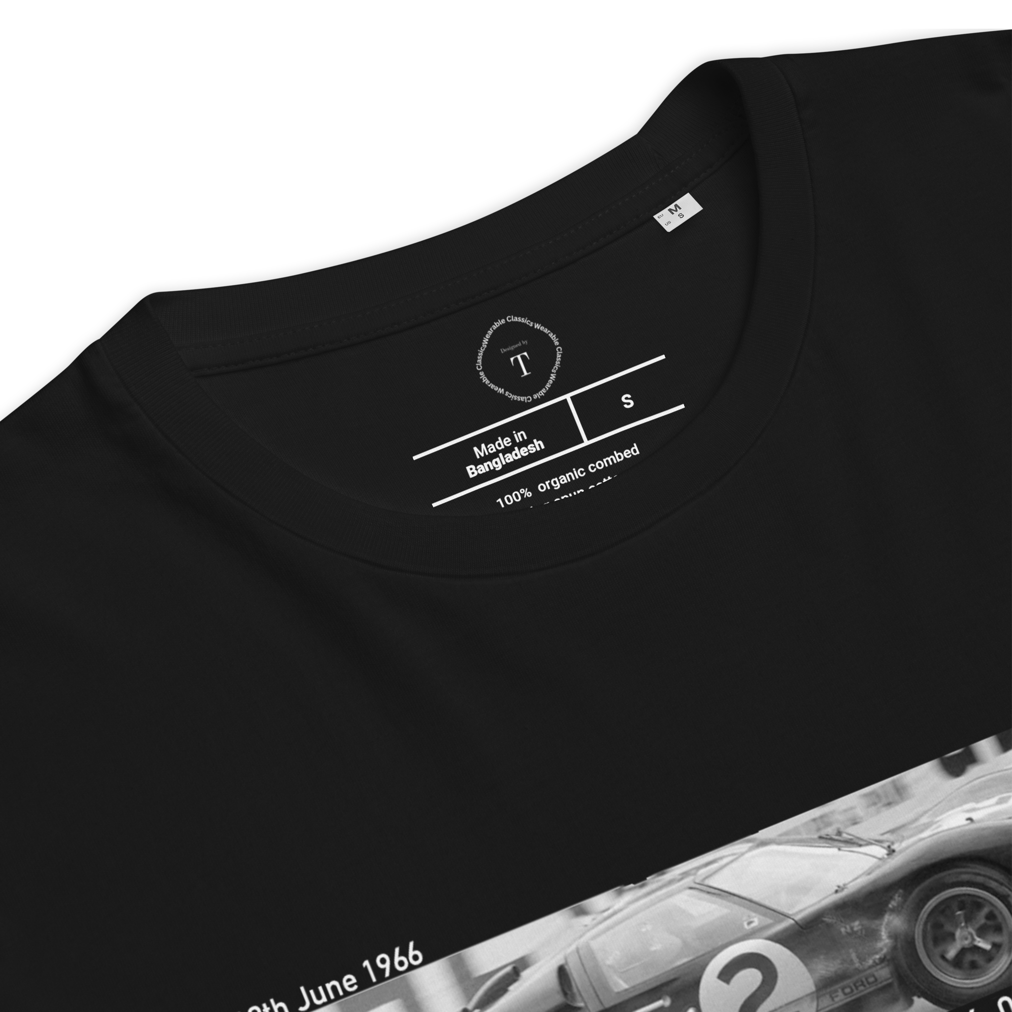 Black Unisex Cotton T-Shirt folded close up with banner image of Le Mans 1966 Ford GT40 at Le Mans in the centre with text of coordinates and date of race