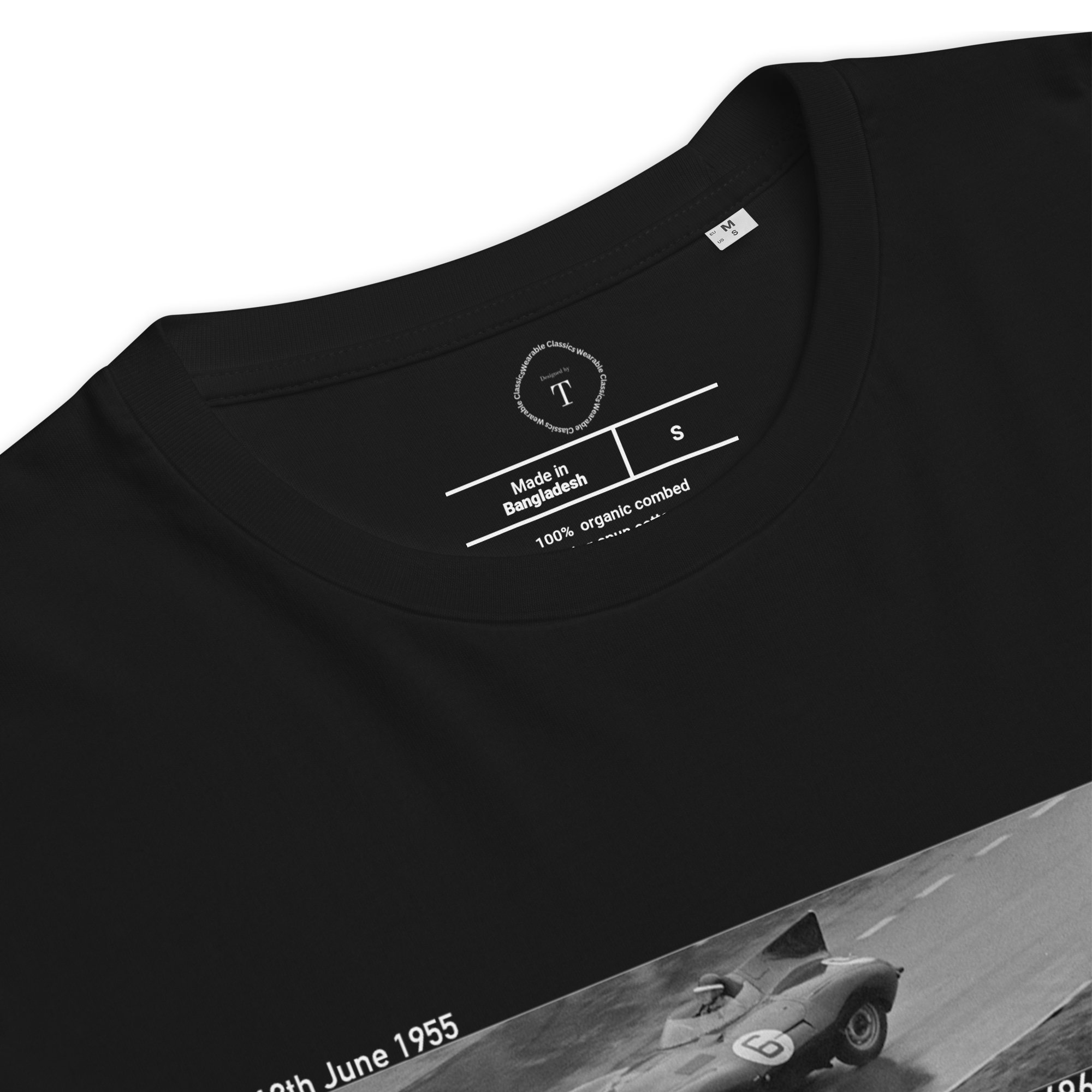 Black Unisex Cotton T-Shirt folded close up with banner image of 1955 Jaguar D Type at Le Mans in the centre with text of coordinates and date of race