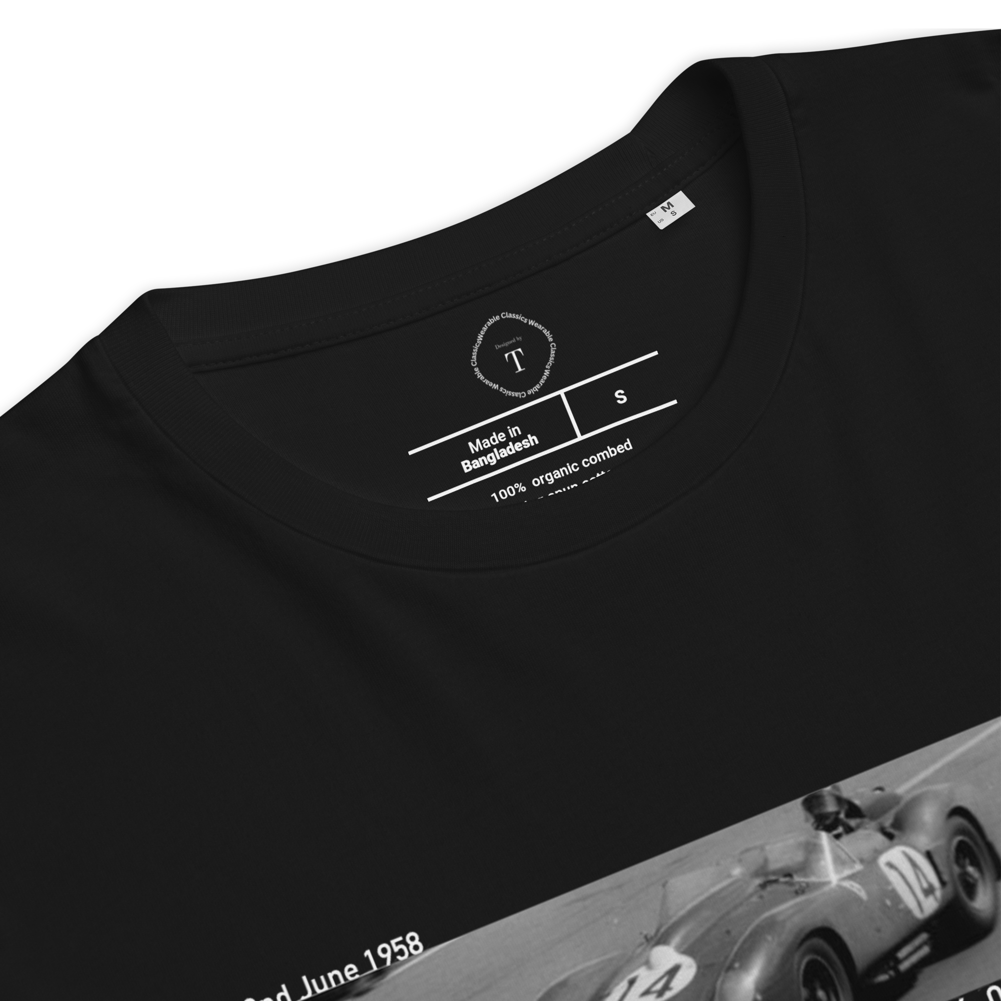 Black Unisex Cotton T-Shirt folded close up with banner image of 1958 Ferrari at Le Mans in the centre with text of coordinates and date of race
