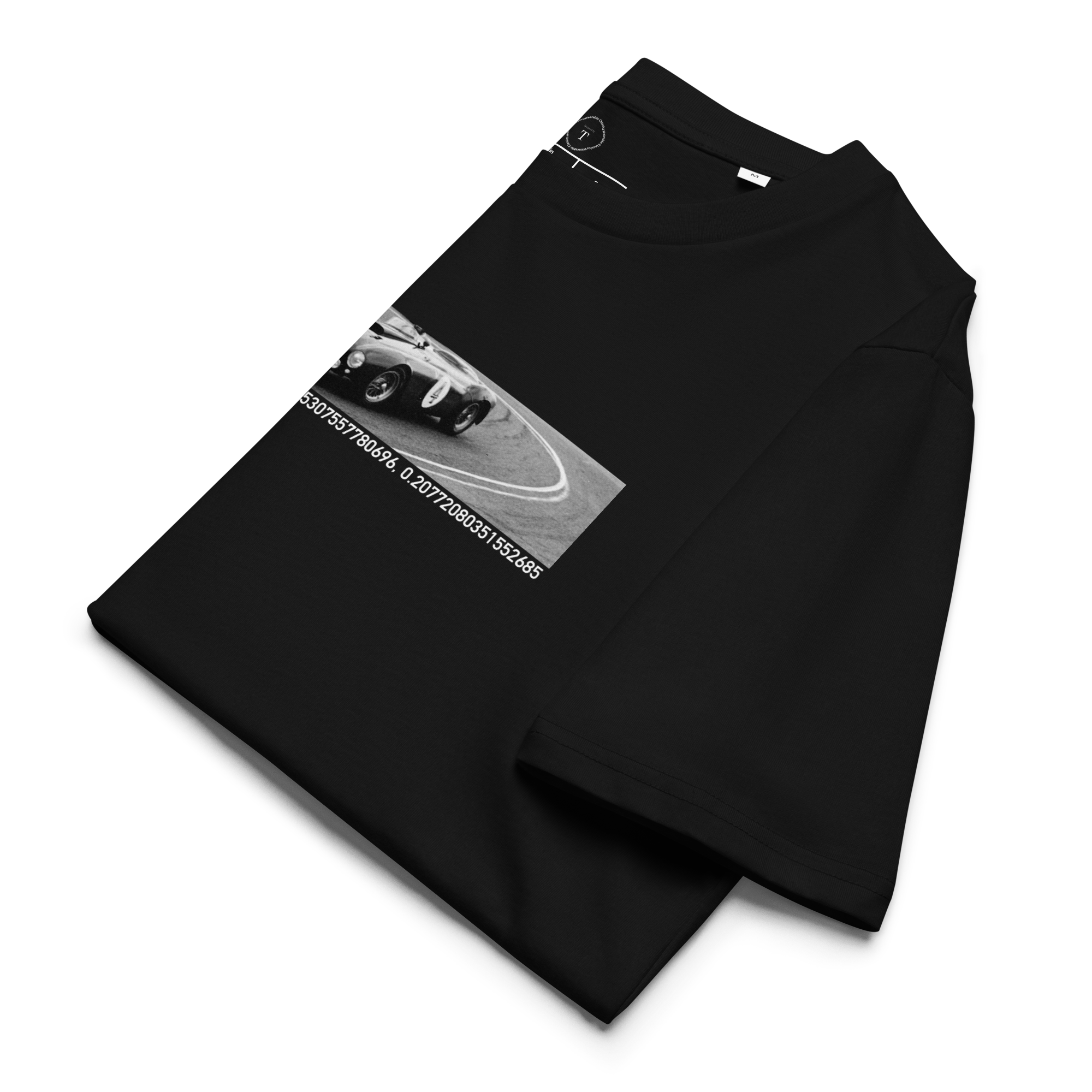 Black Unisex Cotton T-Shirt folded close up with banner image of 1954 Ferrari at Le Mans in the centre with text of coordinates and date of race