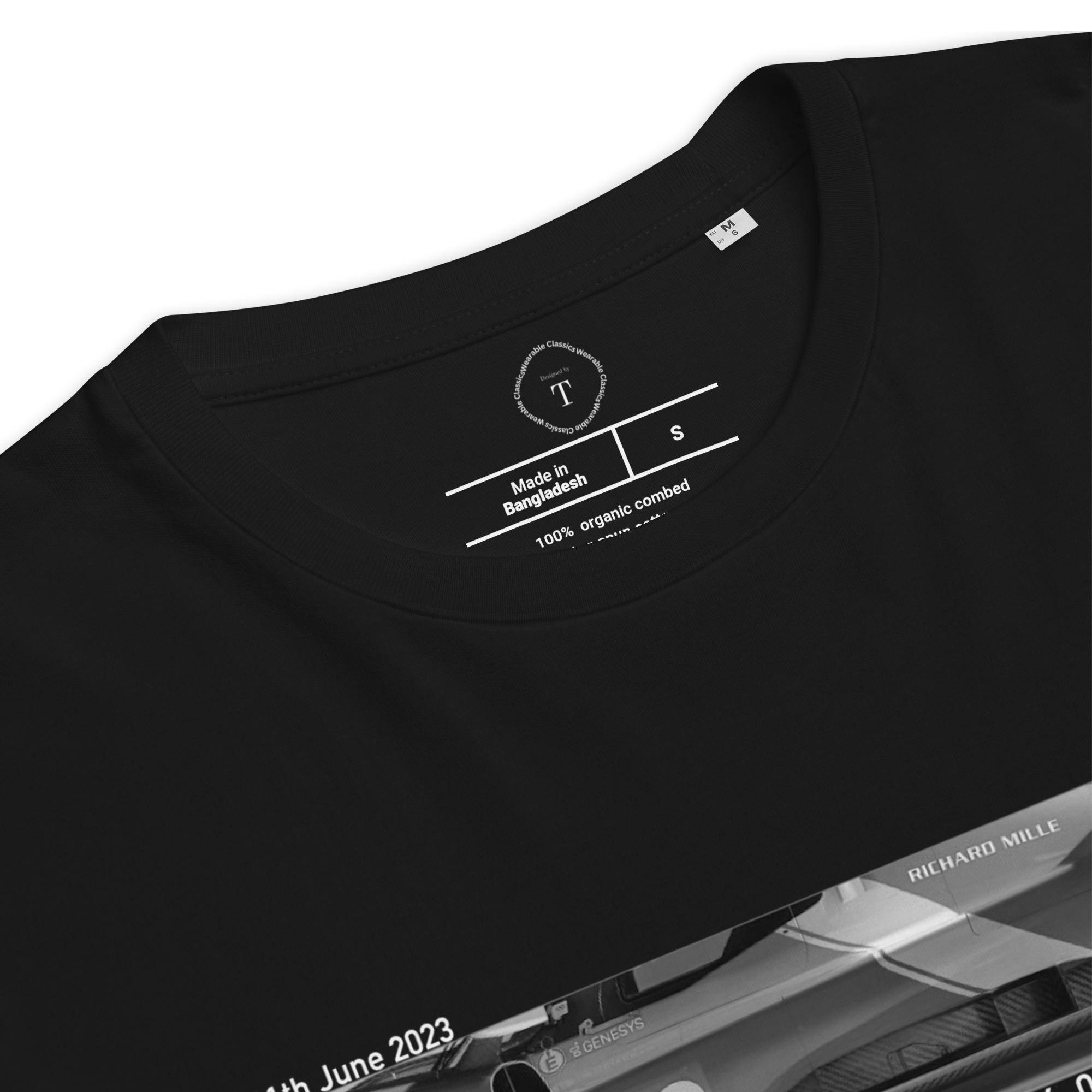 Black Unisex Cotton T-Shirt folded close up with banner image of Ferrari 499P 2023 at Le Mans in the centre with text of coordinates and date of race