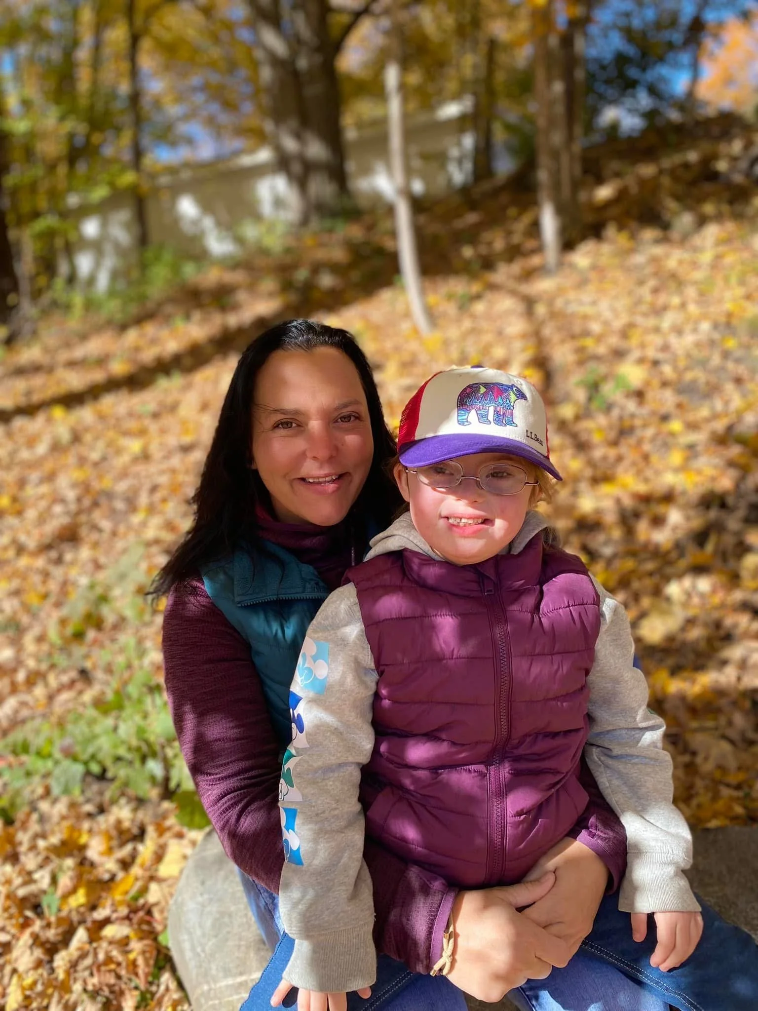 Picture of program director holding her daughter