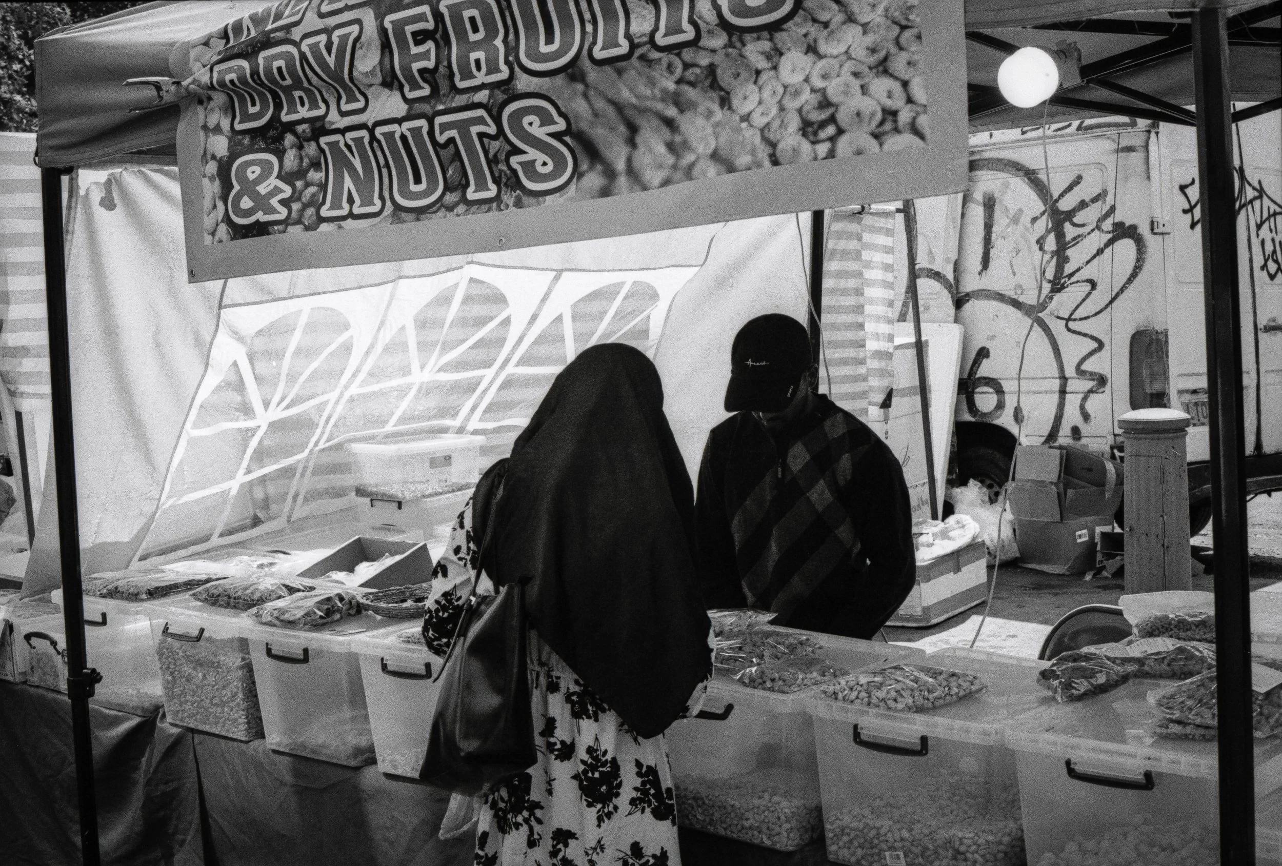 FRUIT AND NUTS STALL : Whitechapel Market, July 2026. OM2 | TMax 400 (rated 640)  | 35mm at f11