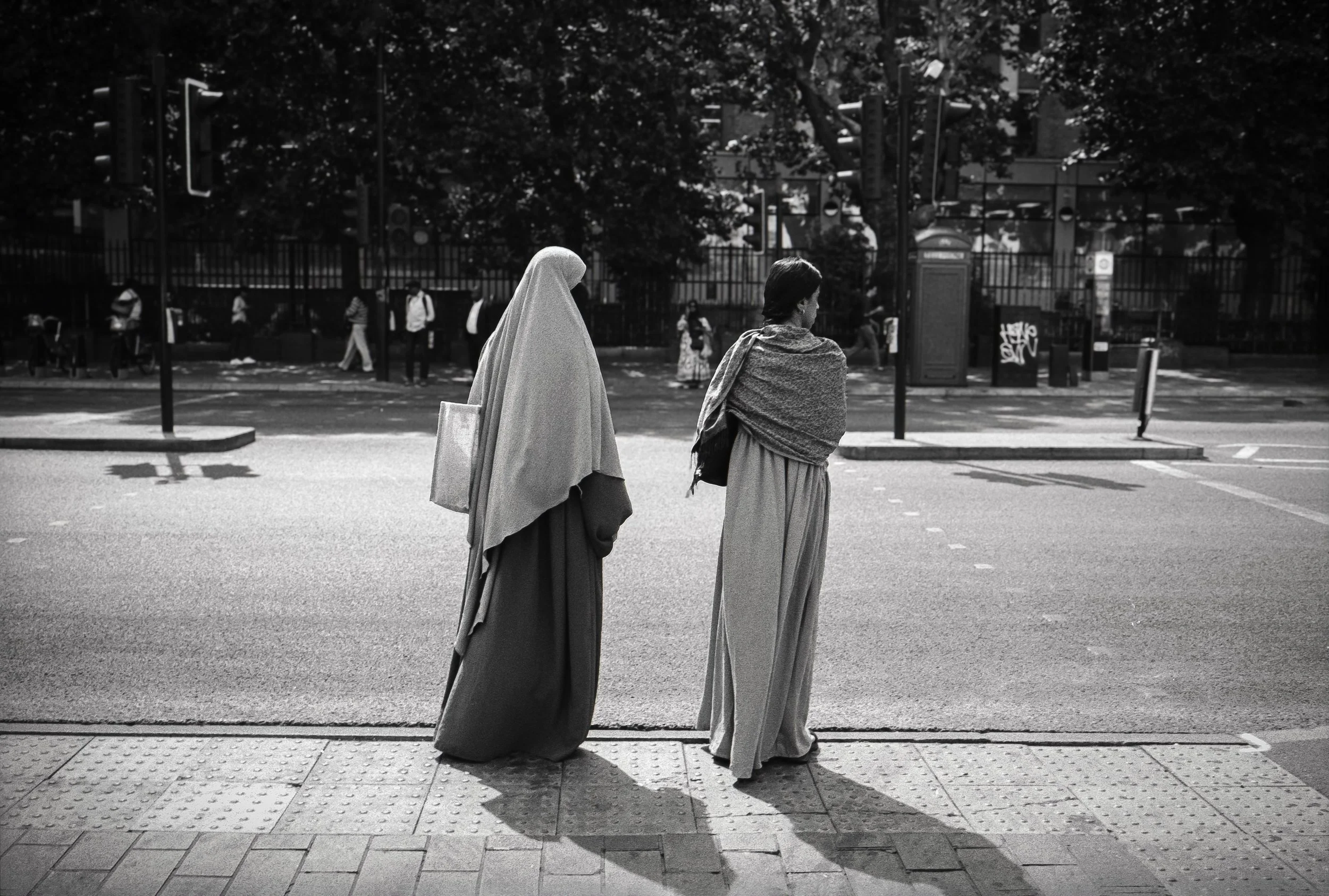 ROAD CROSSING : Whitechapel Market,
July 2026. OM2 | TRI-X  400 (rated 800)  | 35mm at f11