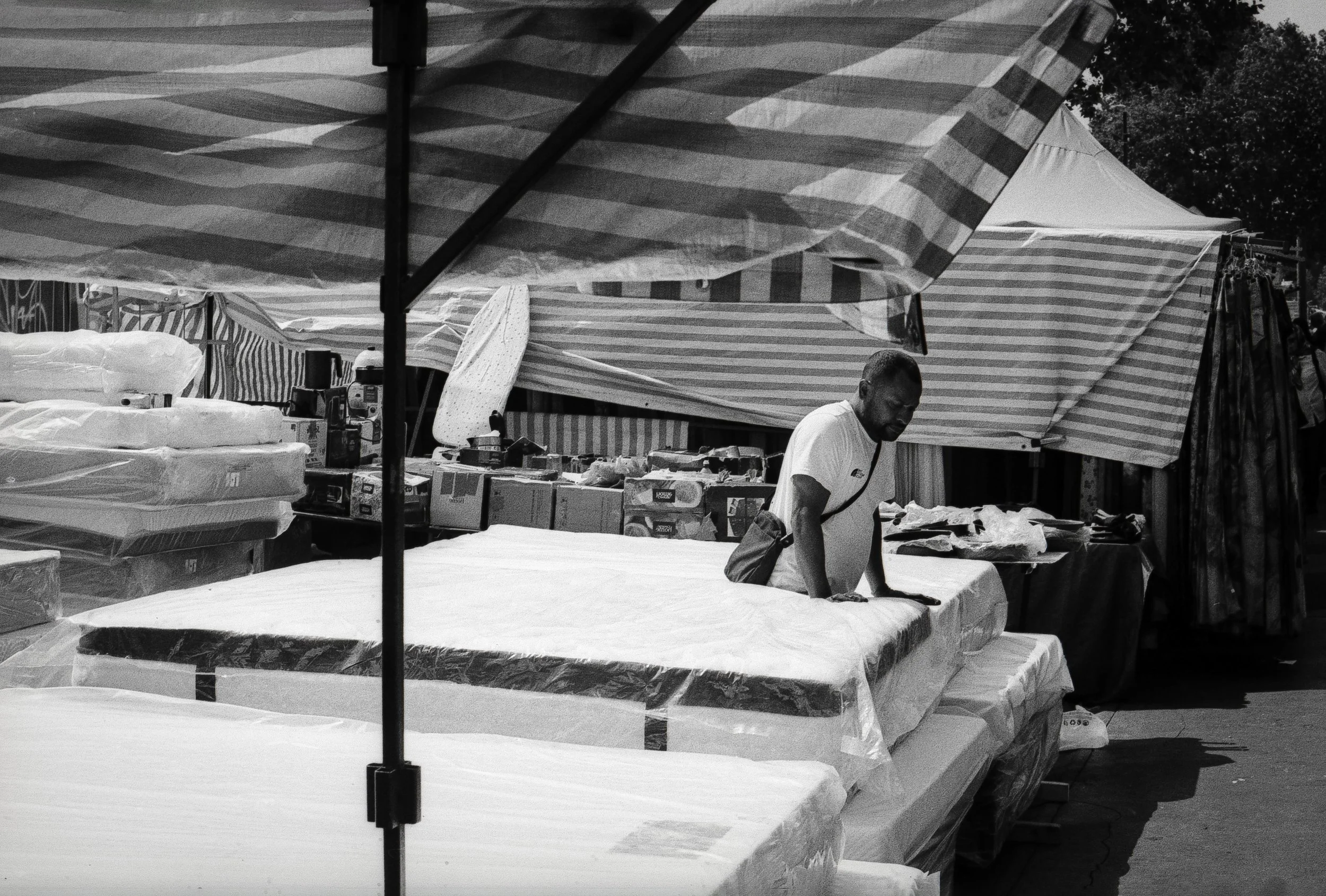TESTING THE BEDDING : Whitechapel Market, July 2026. OM2 | TMax 400 (rated 640)  | 35mm at f11