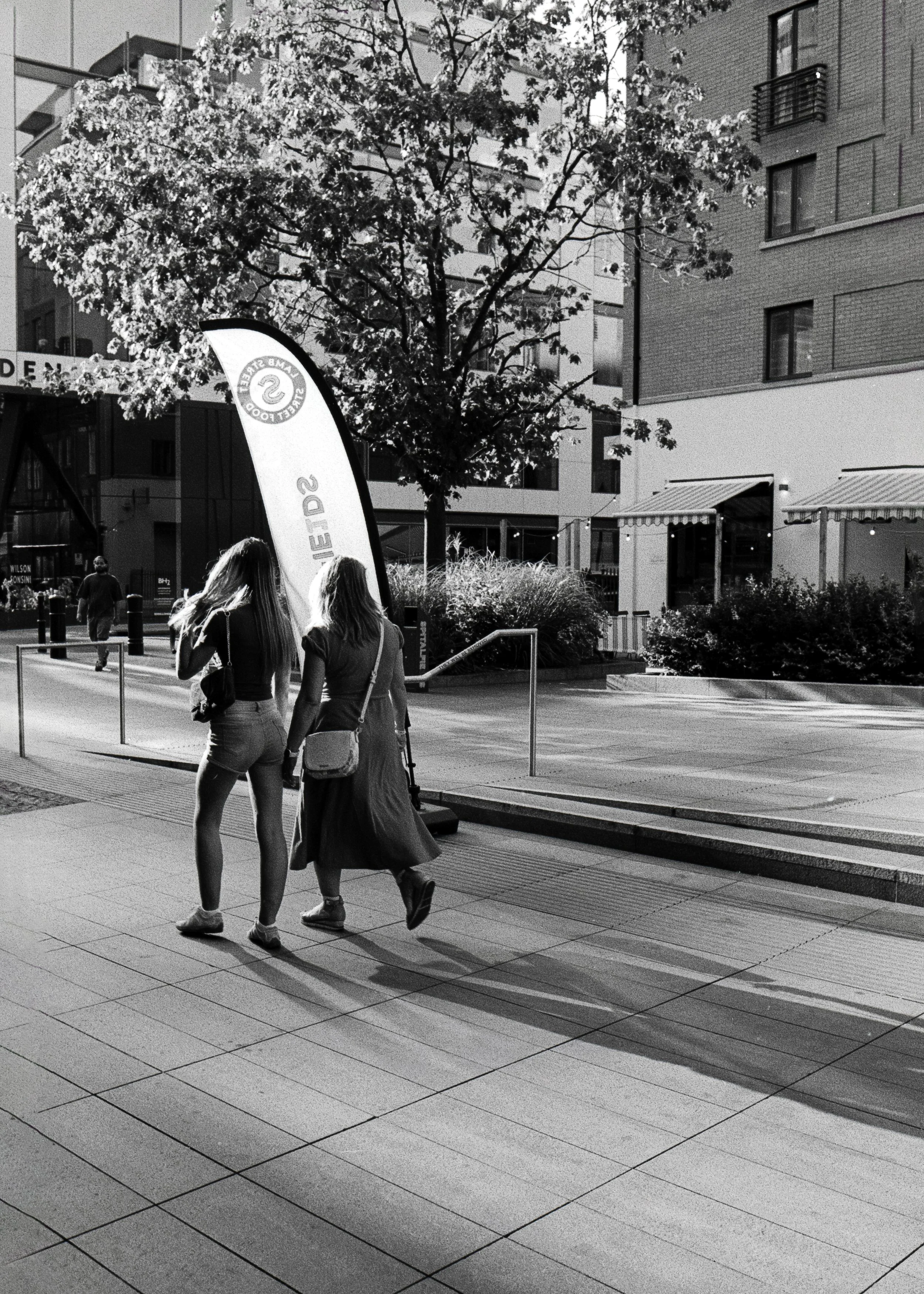 WALKING AWAY : Spitalfields,
August 2026. OM2 | TRI-X  400 (rated 640)  | 35mm at f11