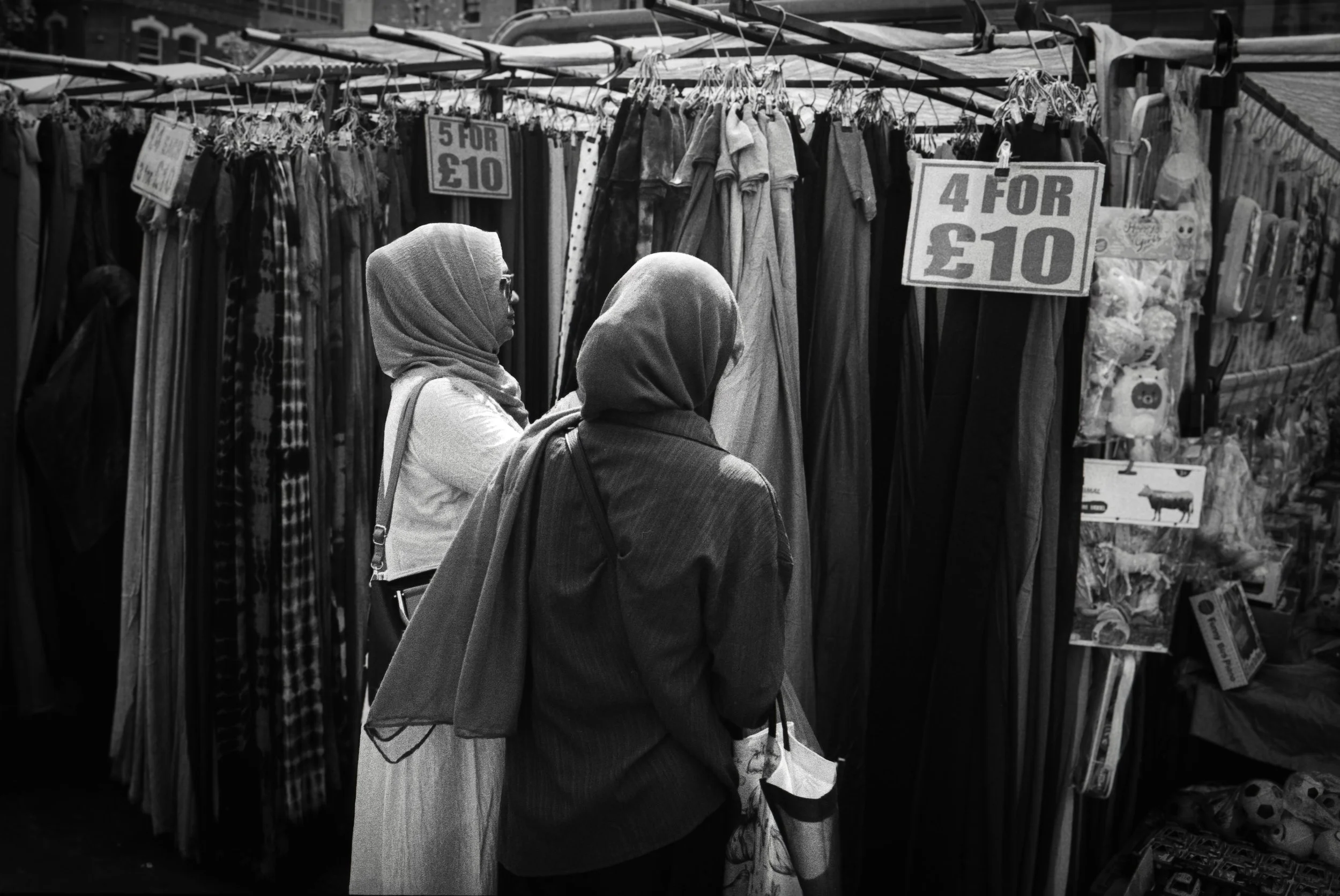 DECISIONS DECISIONS : Whitechapel Market,
July 2026. OM2 | TRI-X  400 (rated 800)  | 35mm at f11
