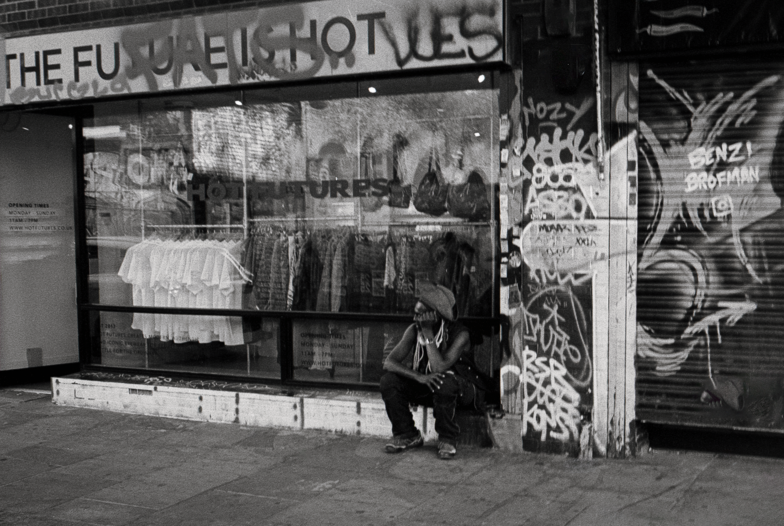 SITTING & WAITING : Brick Lane,
July 2026. OM2 | TRI-X 400 (rated 640)  | 35mm at f11