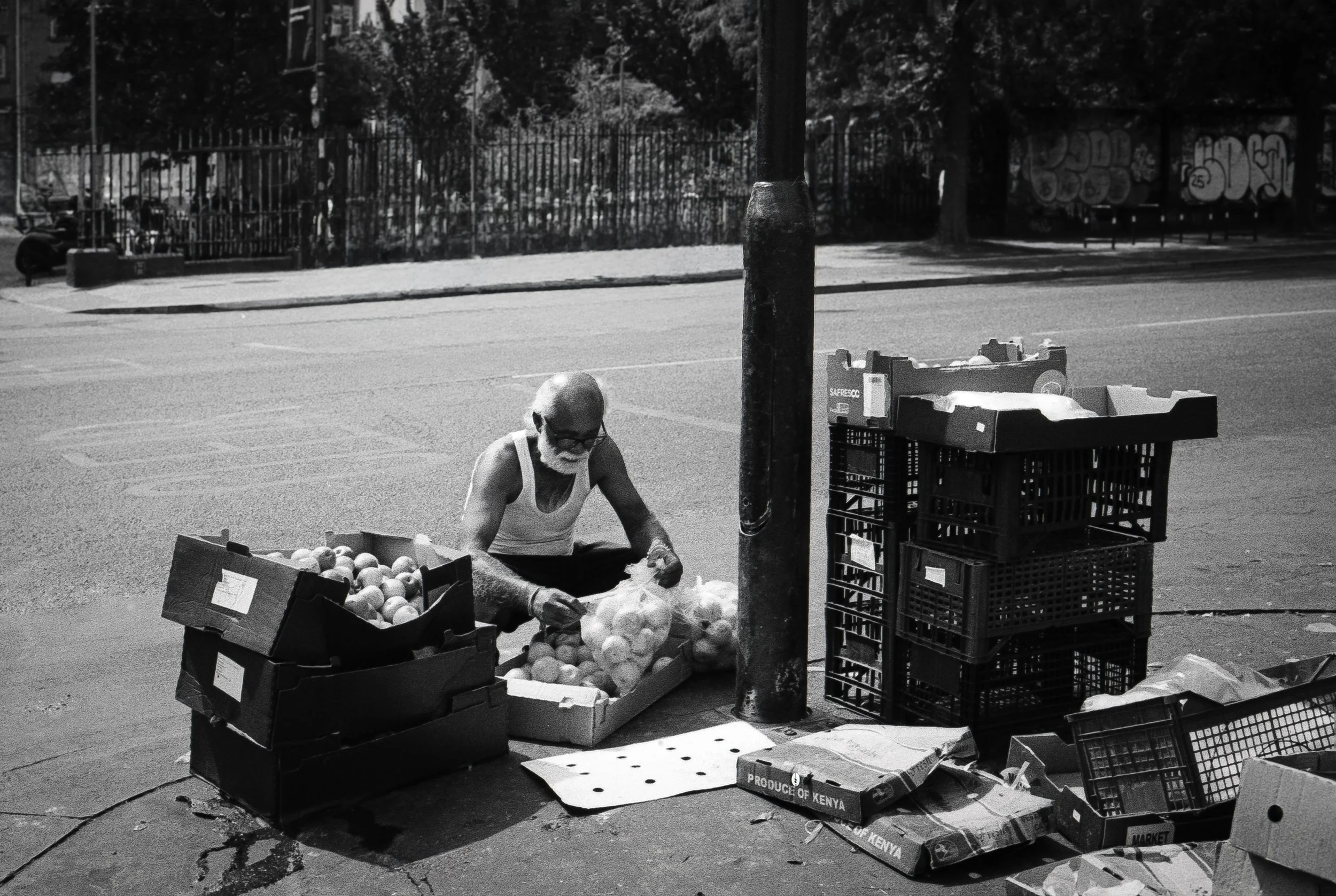 CLEANING FRUIT : Whitechapel Market,
July 2026. OM2 | TRI-X  400 (rated 800)  | 35mm at f11