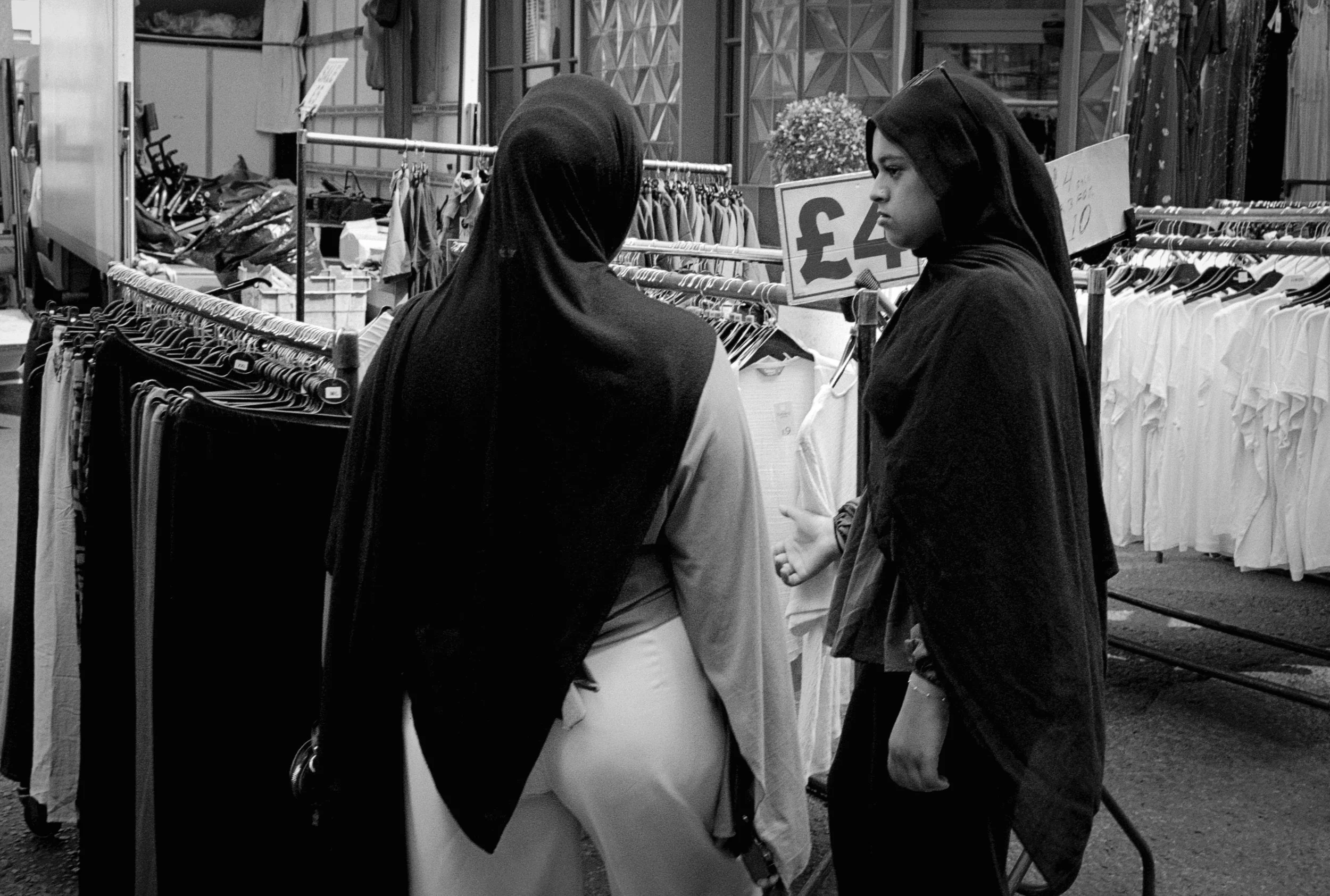STARE : Petticoat Lane,
August 2026. OM2 | TRI-X  (rated 640)  | 35mm at f11