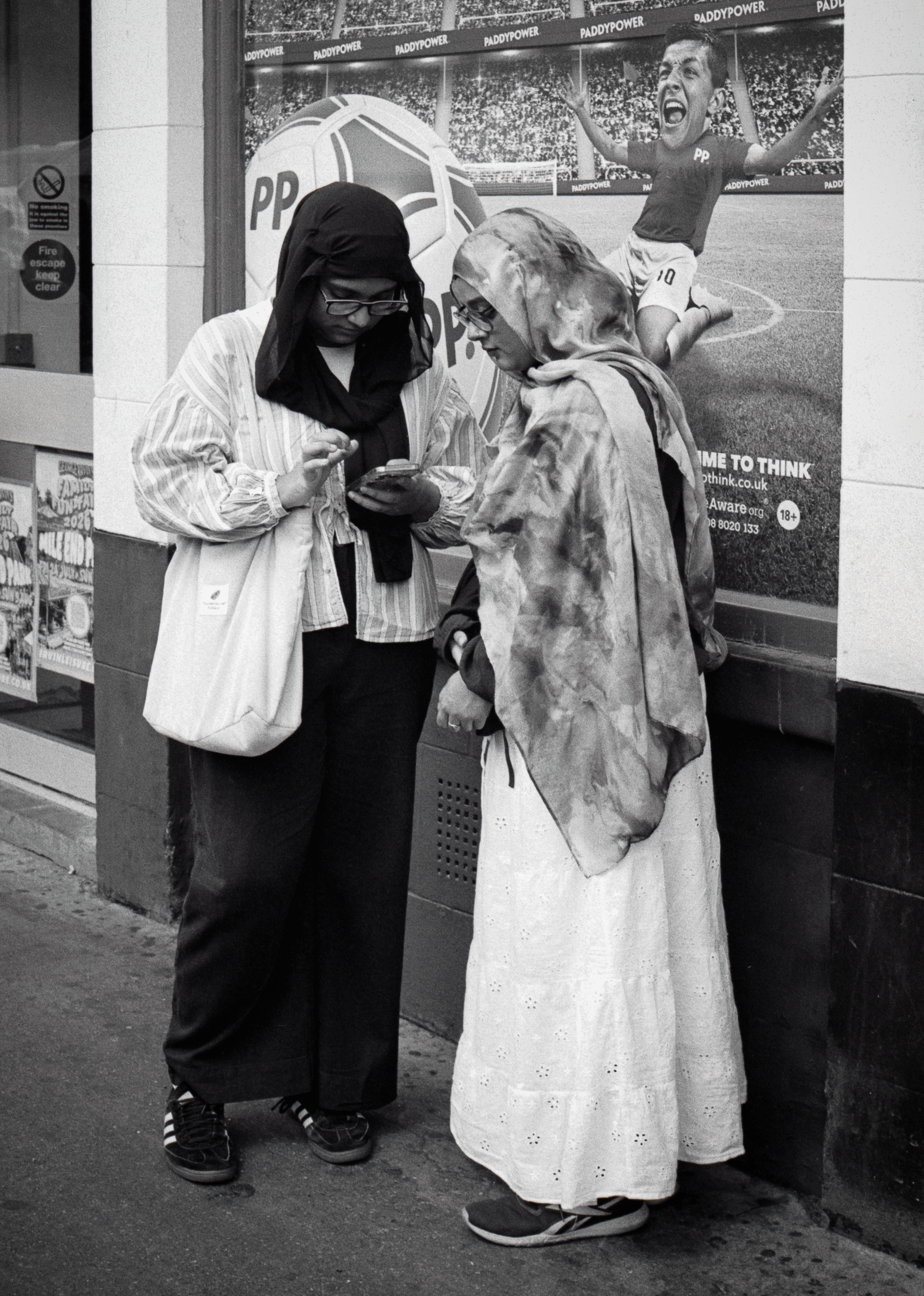 SHARED ONLINE :  Whitechapel Market,
July 2026. OM2 | TRI-X  400 (rated 640)  | 35mm at f11
