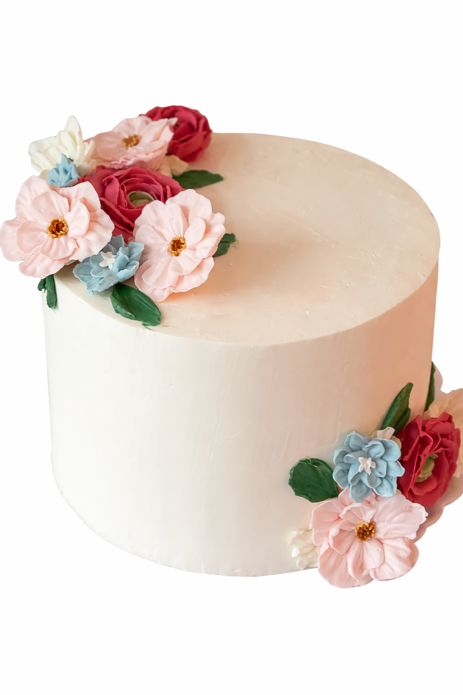 White cake decorated with colorful buttercream florals