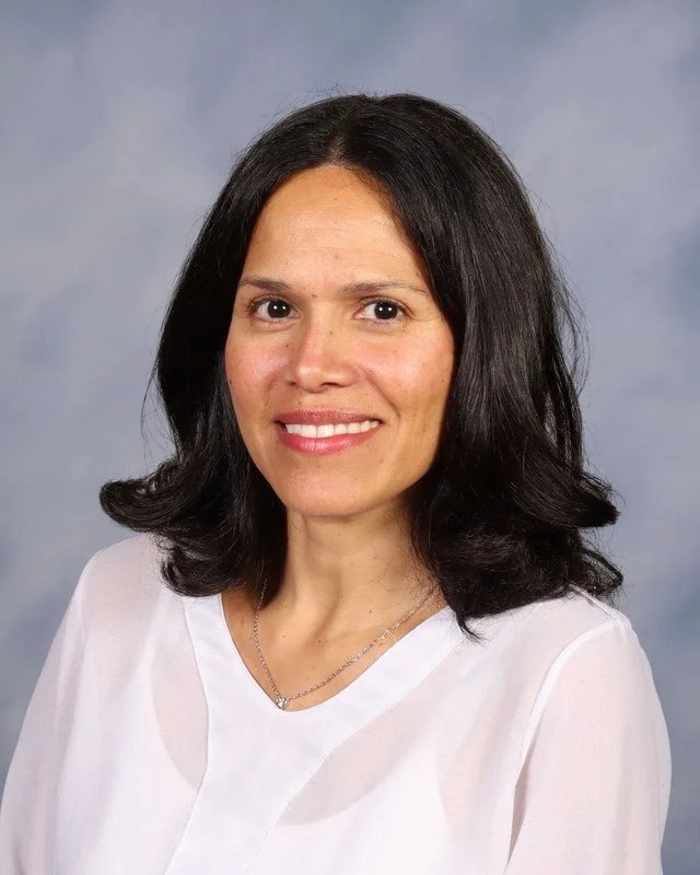 A shield emblem featuring crossed arrows and a stylized letter 'C' and 'X' with a lightning bolt, all in a blue and white color scheme.