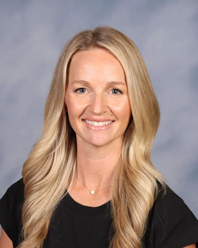 A stylized emblem featuring a shield with a lightning bolt crossing behind the letter 'C' and 'K', representing a security or protection theme.