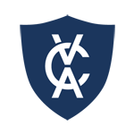 A dark blue shield with a stylized crest and the letters 'C' and 'X' in the center.