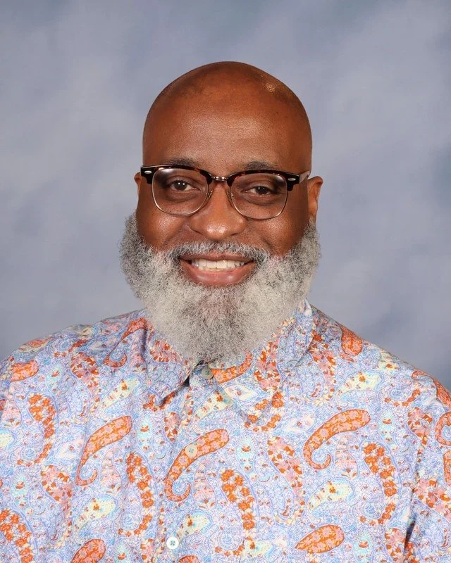 A shield-shaped emblem with a ninja throwing stars and a katana sword behind the letters 'C' and 'K'.
