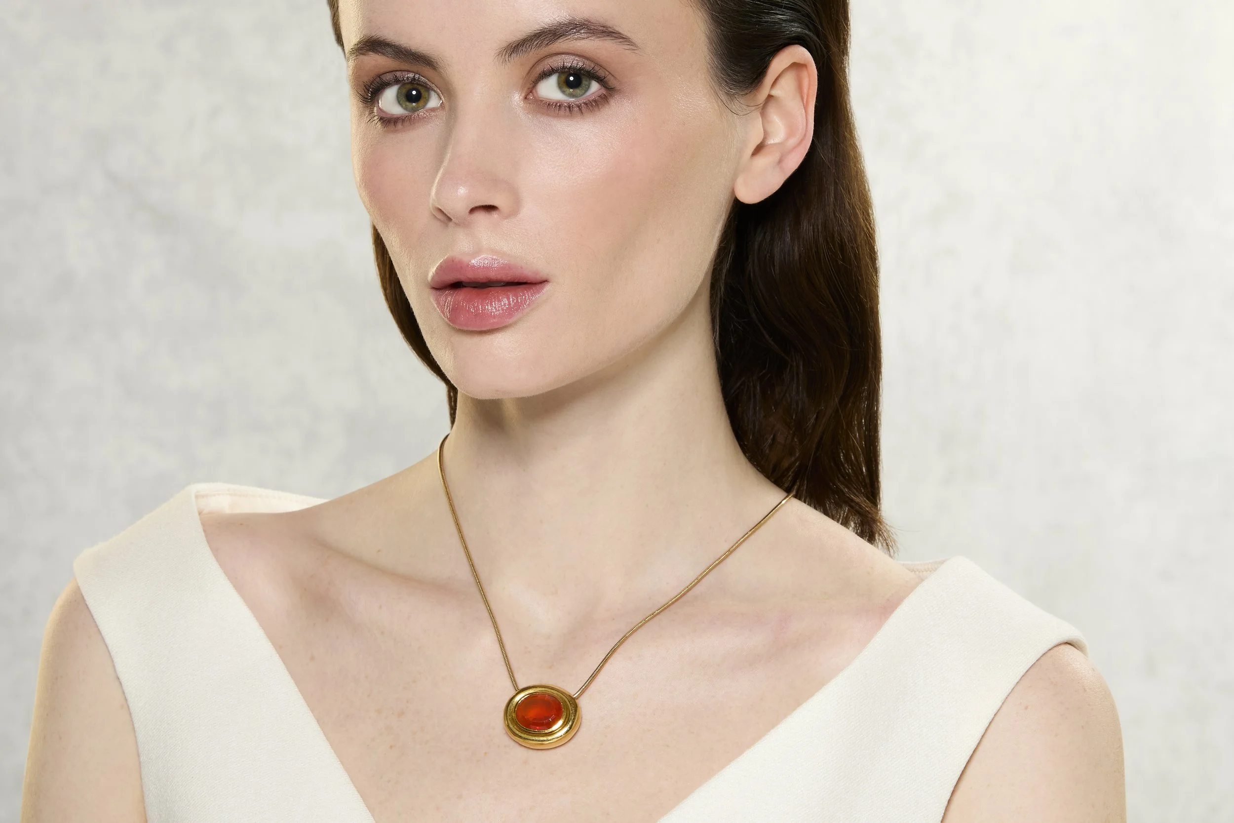 professional makeup for a jewelry campaign photoshoot in Boston model with glowing skin soft glam natural and clean
