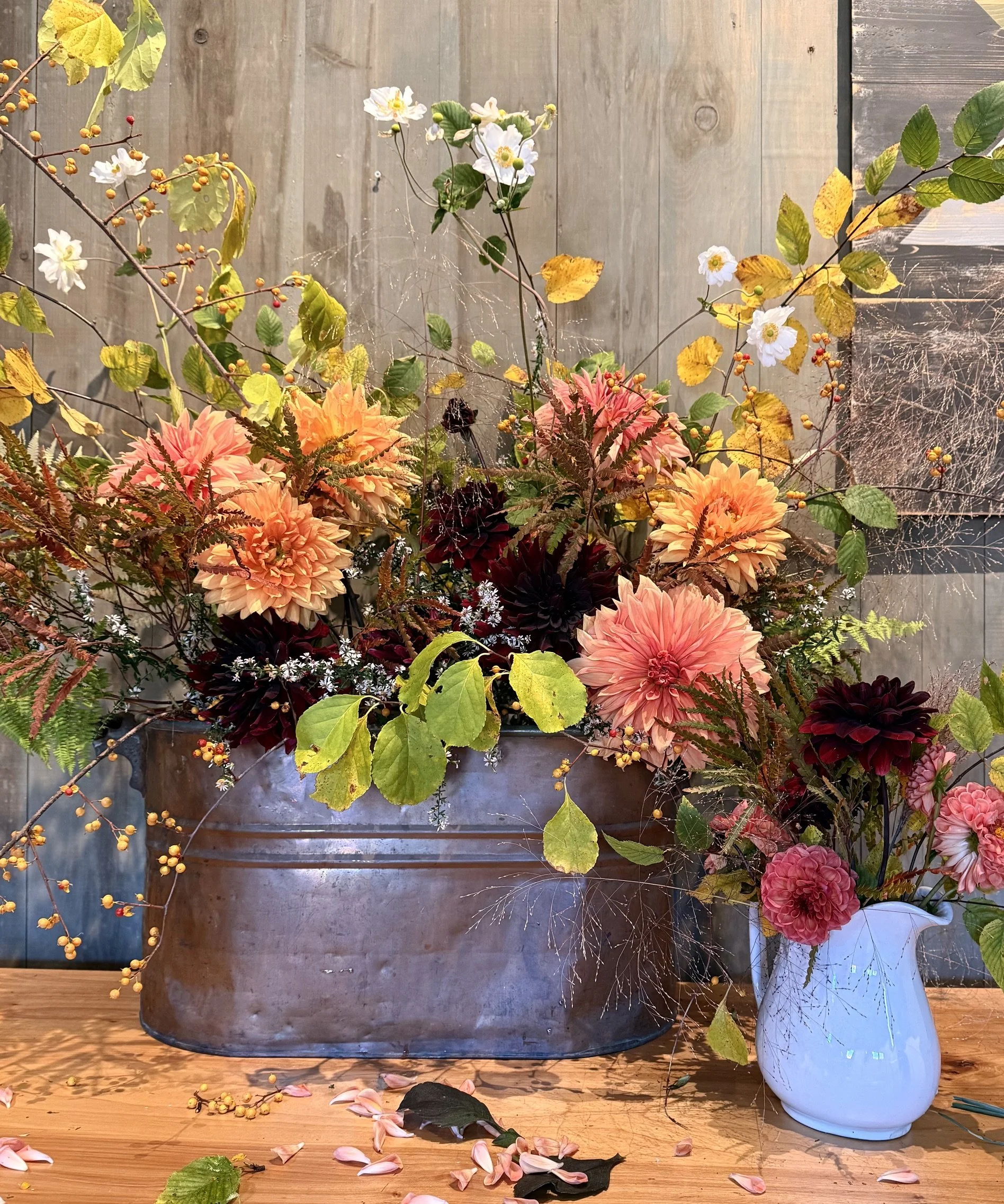 fall flowers in copper bin.jpeg