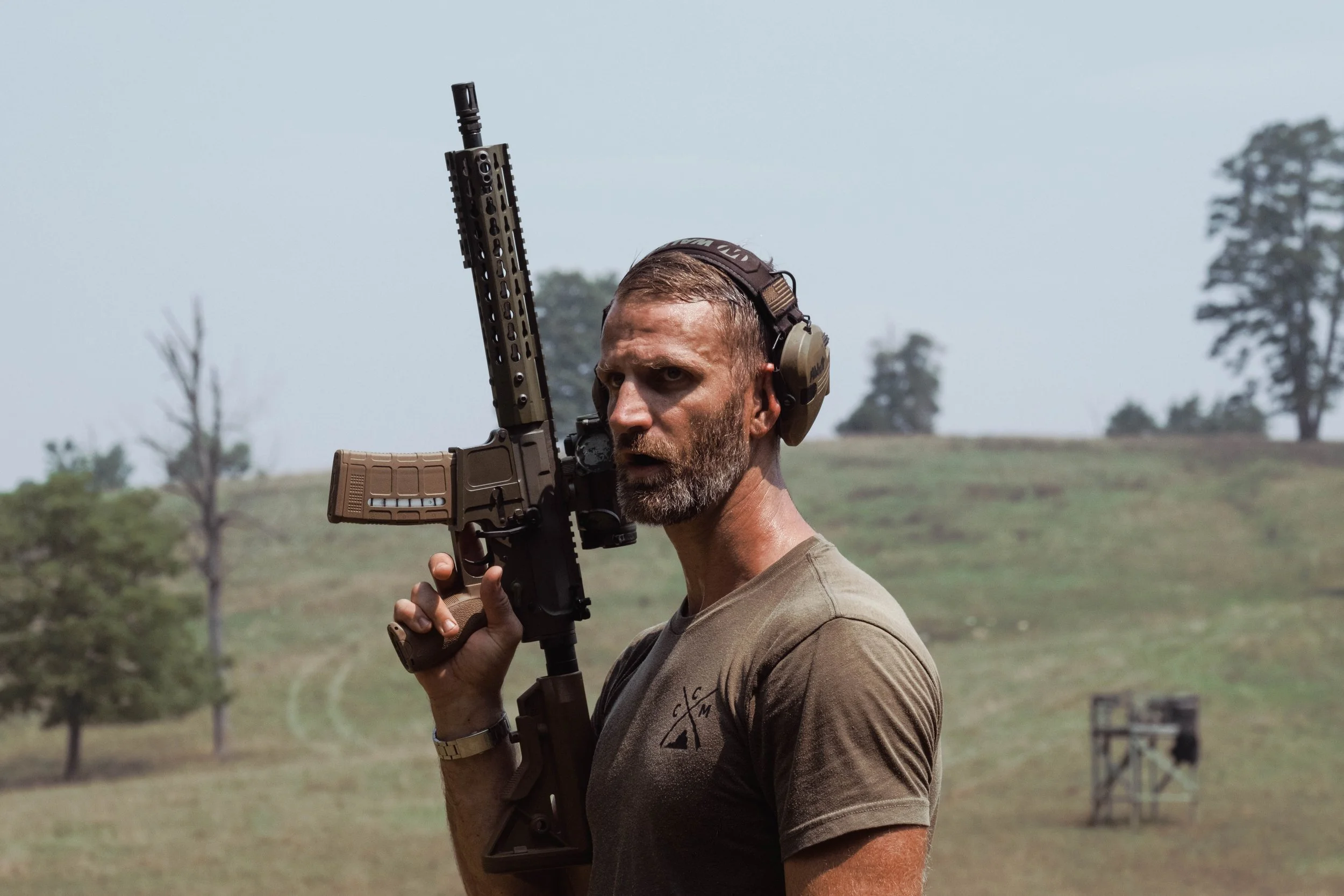 Dan Abbott, leader of the militia, giving a lecture on long-range fire. July 18, 2026.