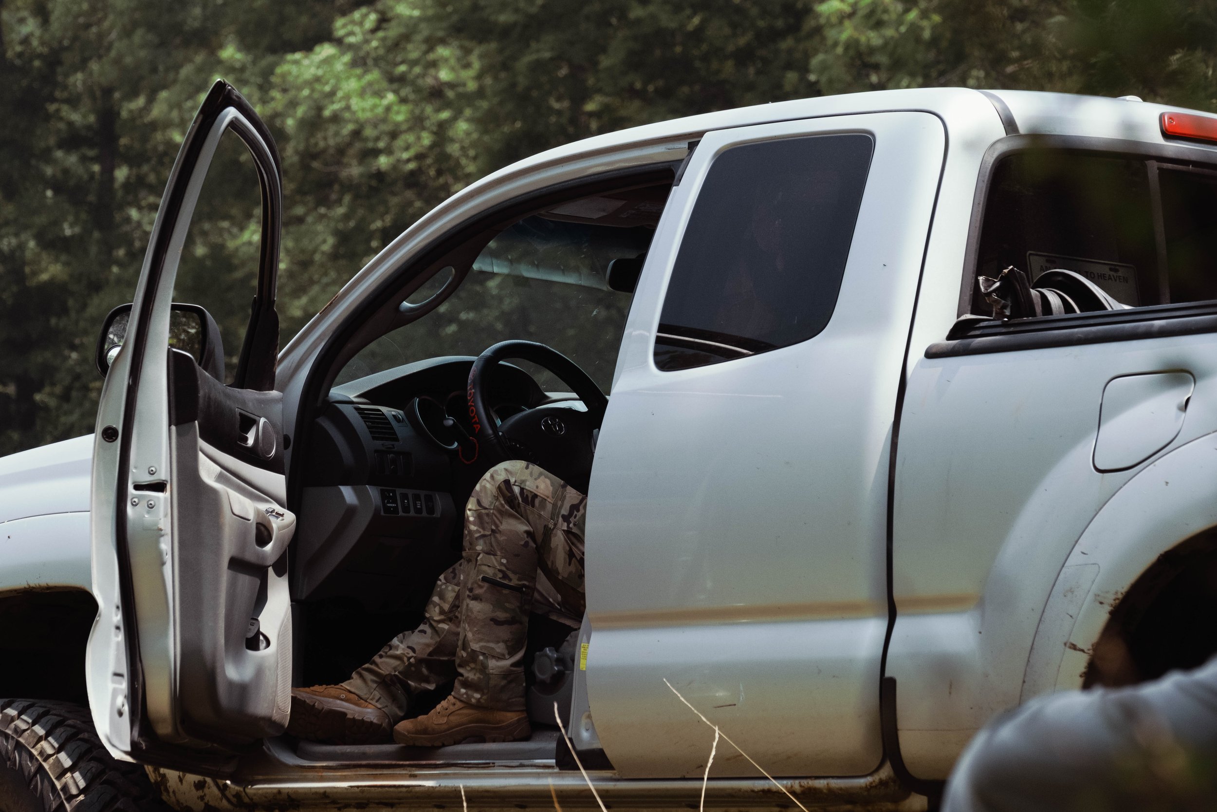 A militia member relaxing in the car. July 18, 2026.