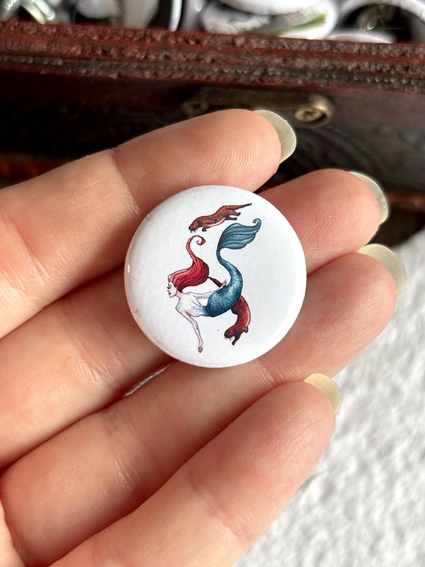 isabelle.algrin.pinbadges.ottersmermaid.jpg